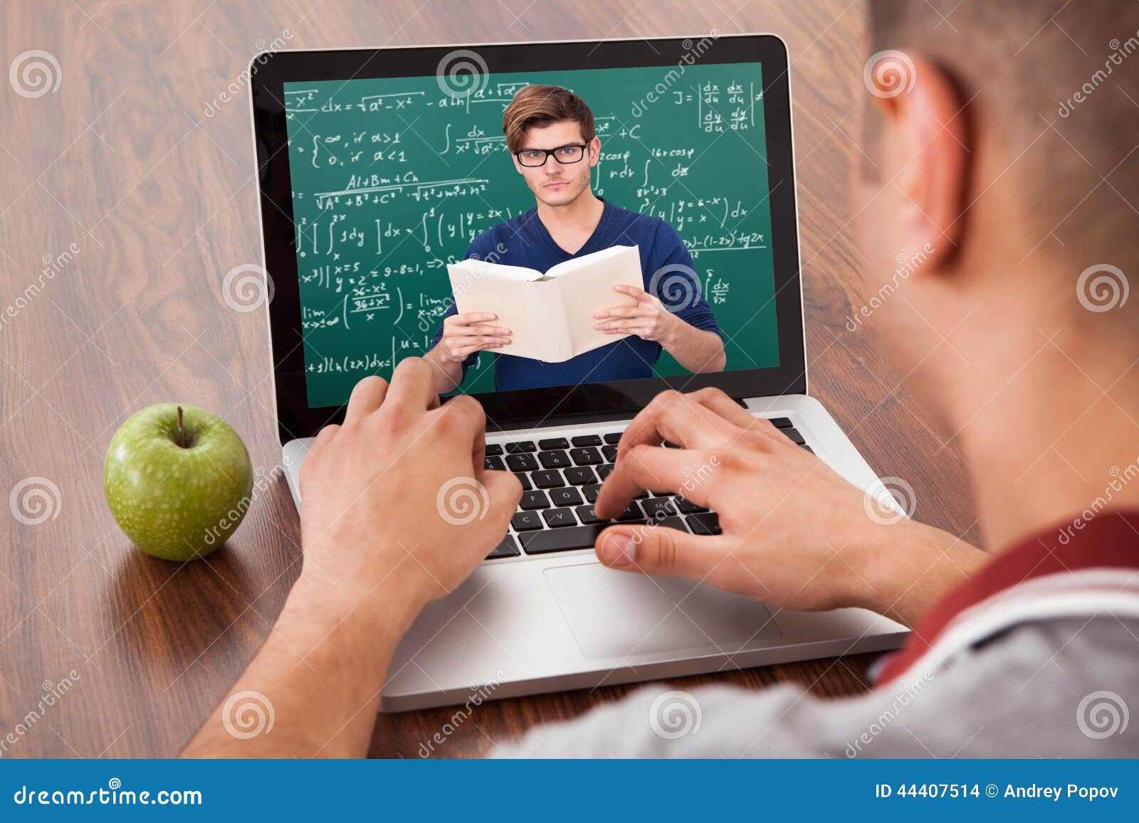 student attending online math's lecture on laptop