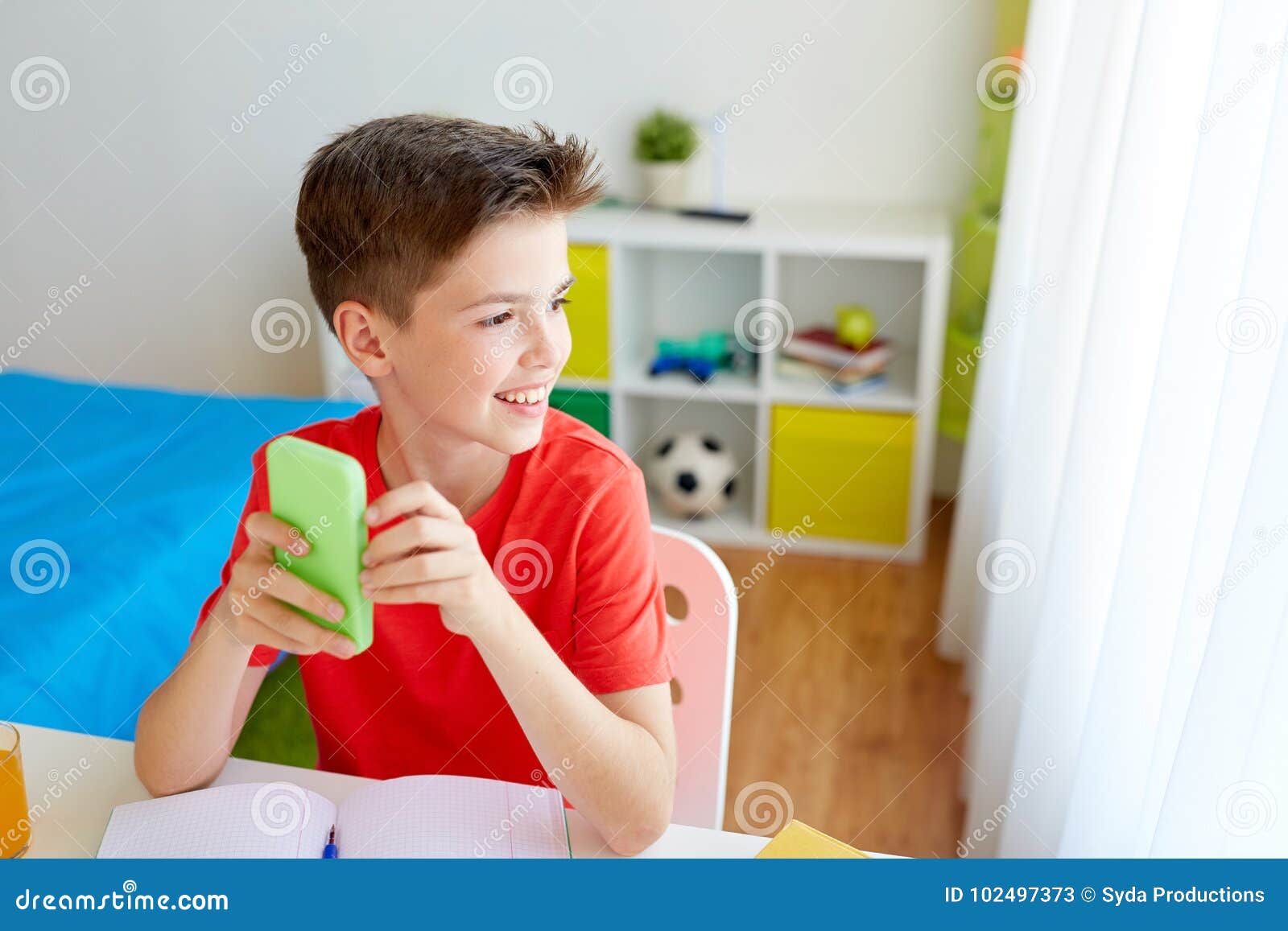 Student Boy with Smartphone Distracting from Study Stock Image Image