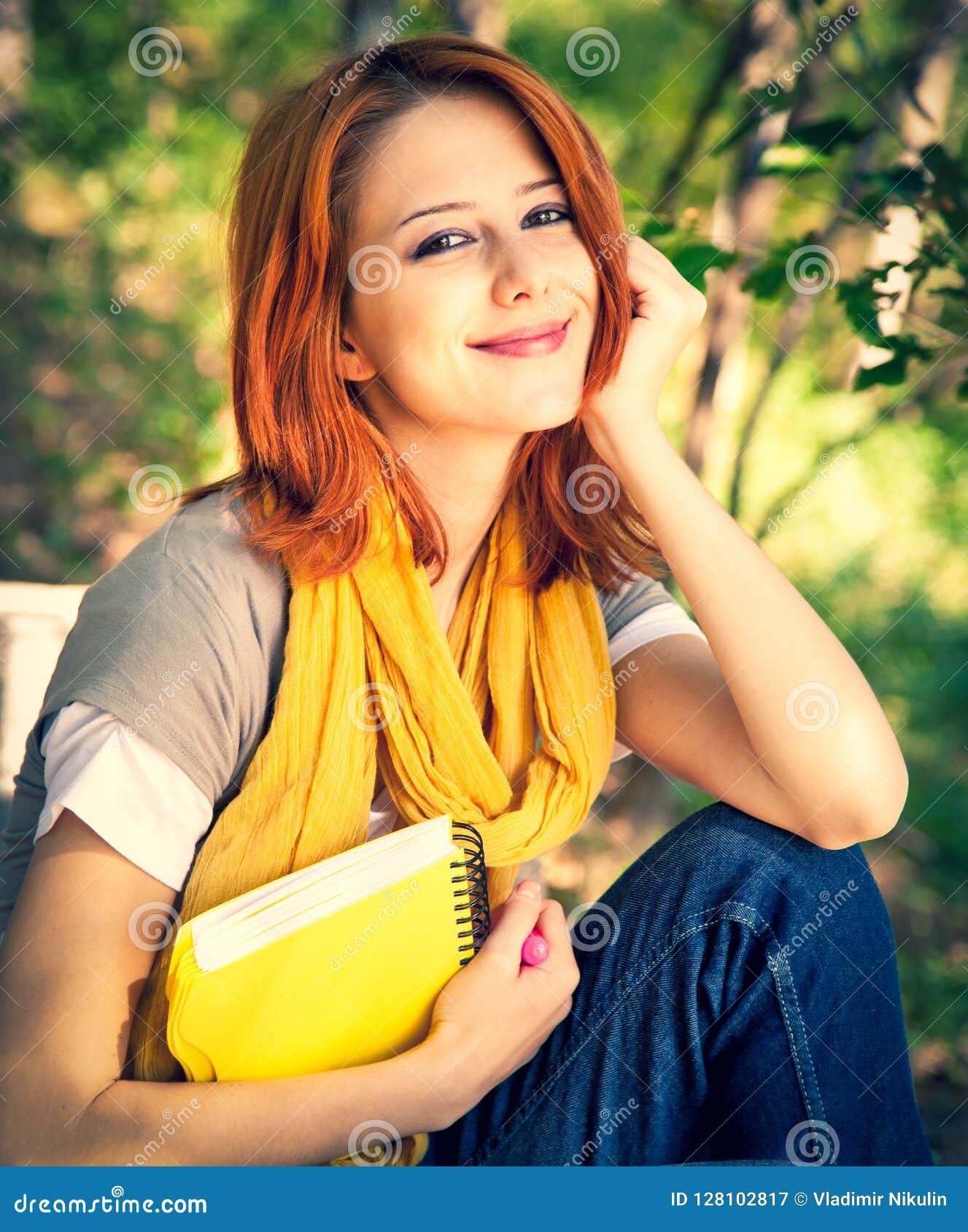 Student Girl With Notebook Sitting At Outdoor Stock I