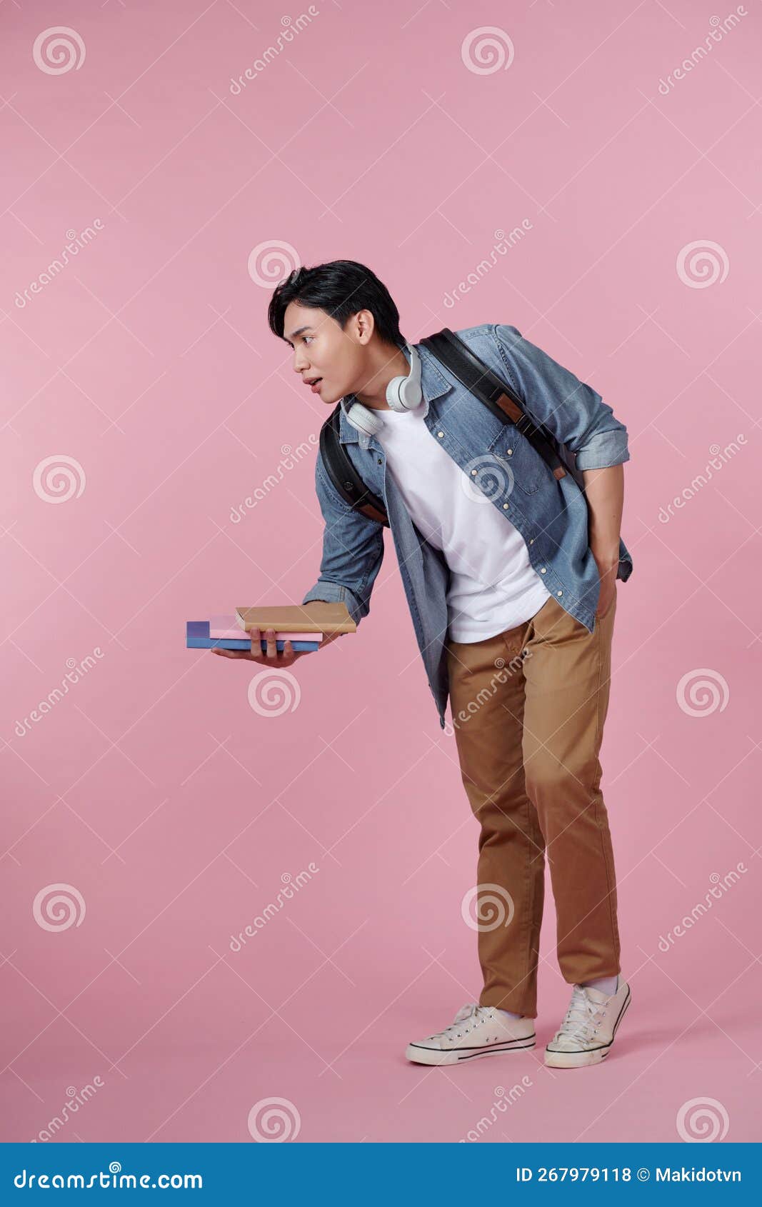 Student with Heavy Book Isolated on Pink Stock Photo Image of