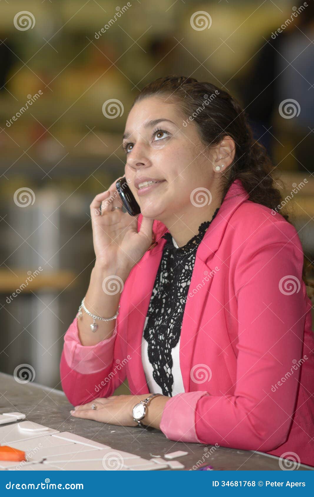 student phoning in  lab