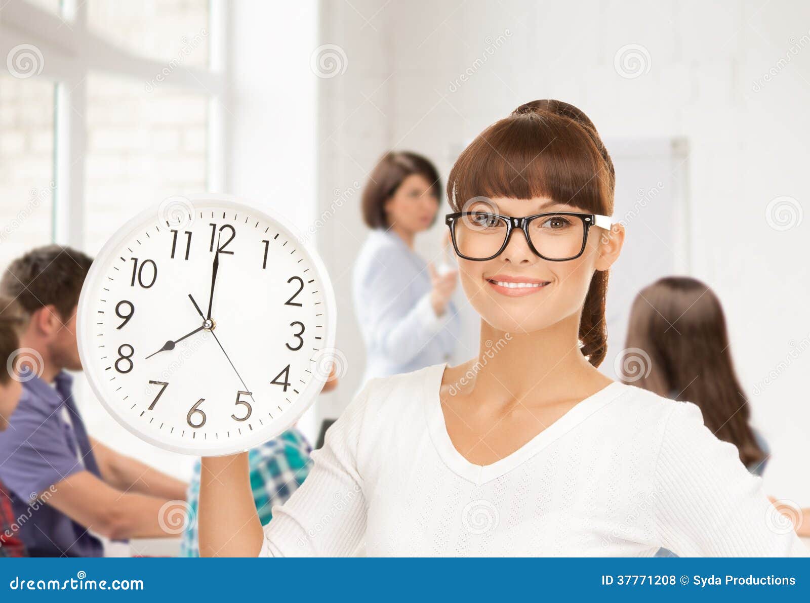 Student showing clock stock photo. Image of classroom 37771208