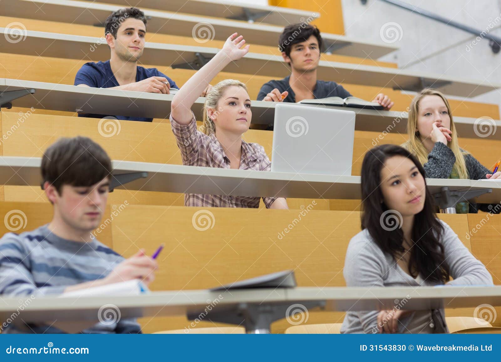 students having a lesson in the lecture hall