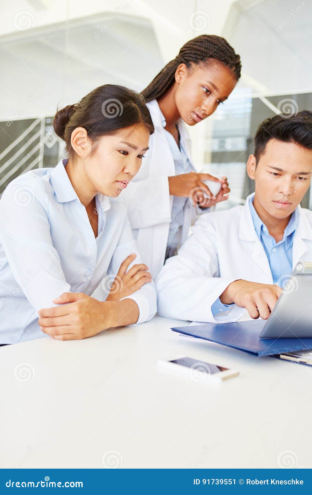Students Reaserching with Tablet in Medical School Stock Image Image