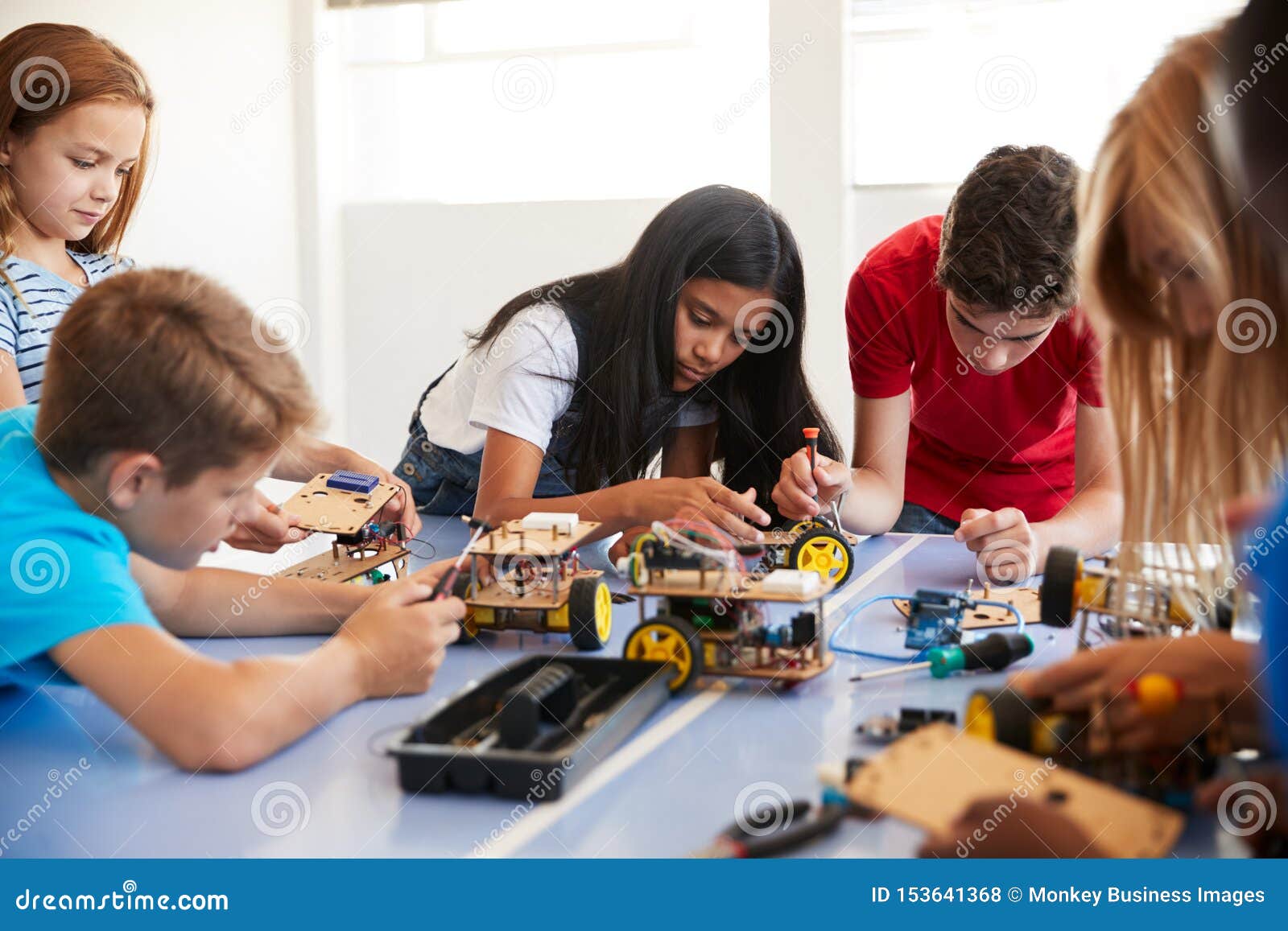 Students in after School Computer Coding Class Building and Learning To ...