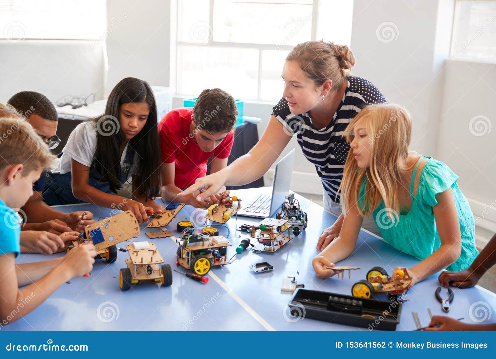 Students in after School Computer Coding Class Building and Learning To ...