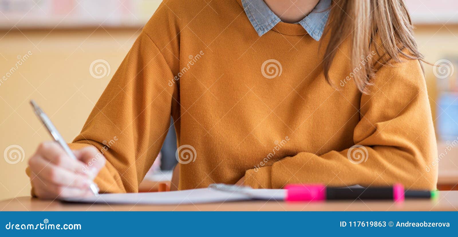 students taking exam in classroom. education test, exams concept. web banner.