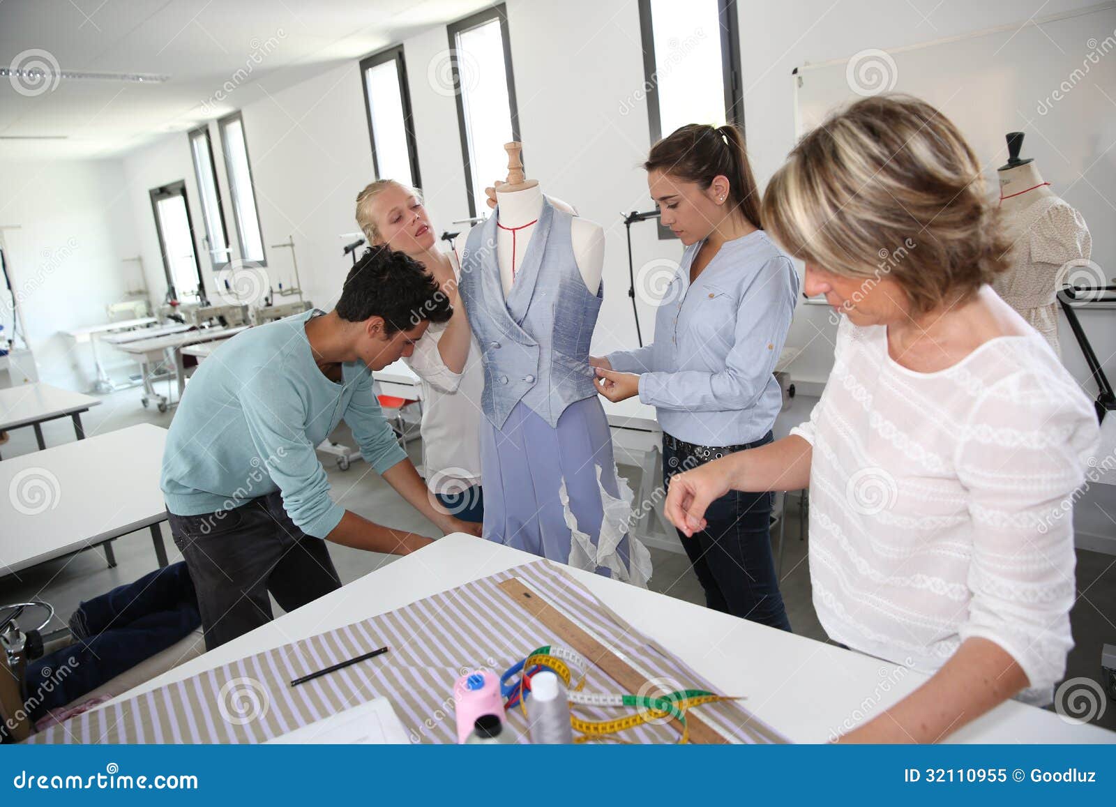 Students with Teacher in Dressmaking Class Stock Image - Image of ...
