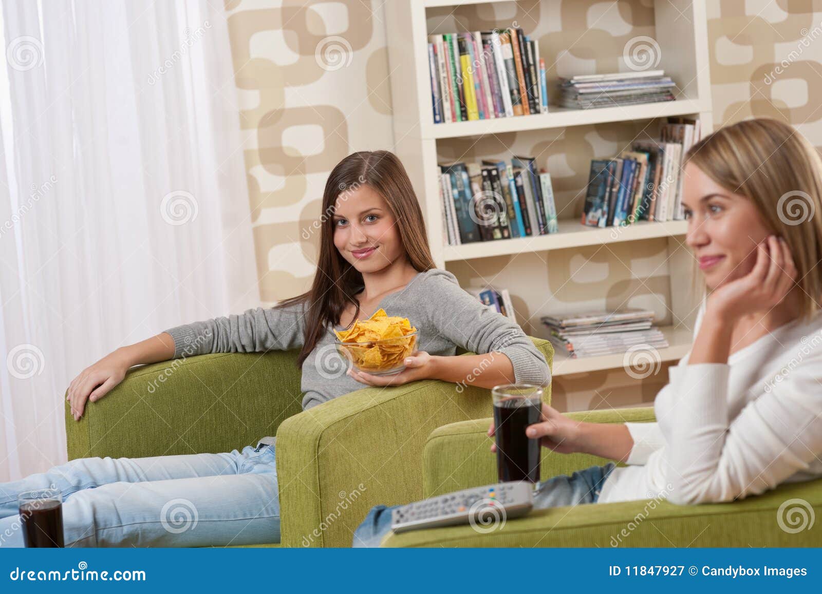 Students - Two Female Teenager Watching Television Stock Image - Image ...