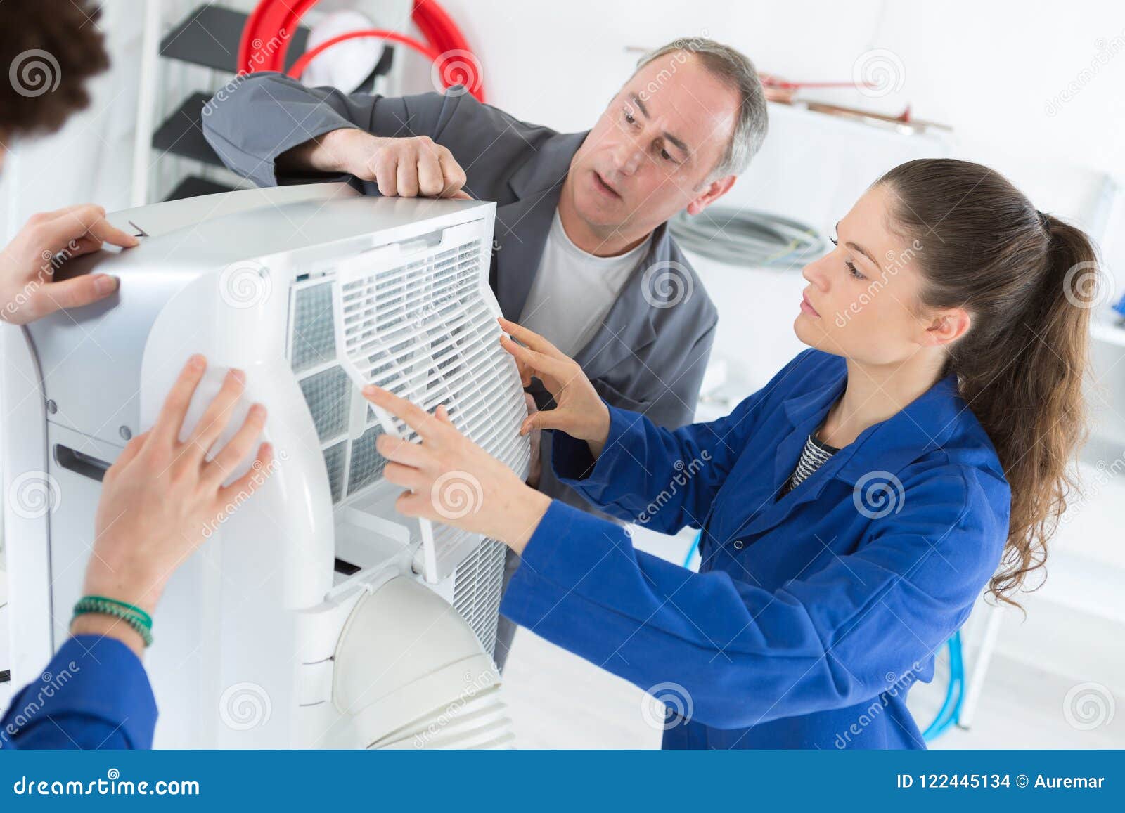 Students Working on Air Conditioning Unit Stock Photo Image of male, trainee 122445134