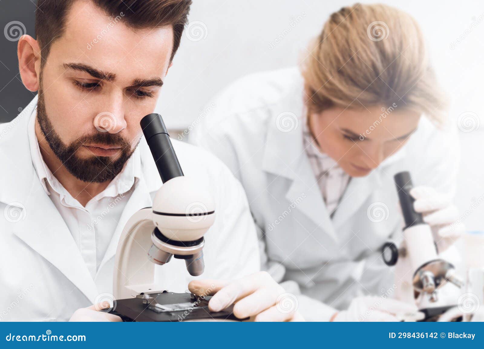 Students are Working in a Laboratory Using Microscopes during Science