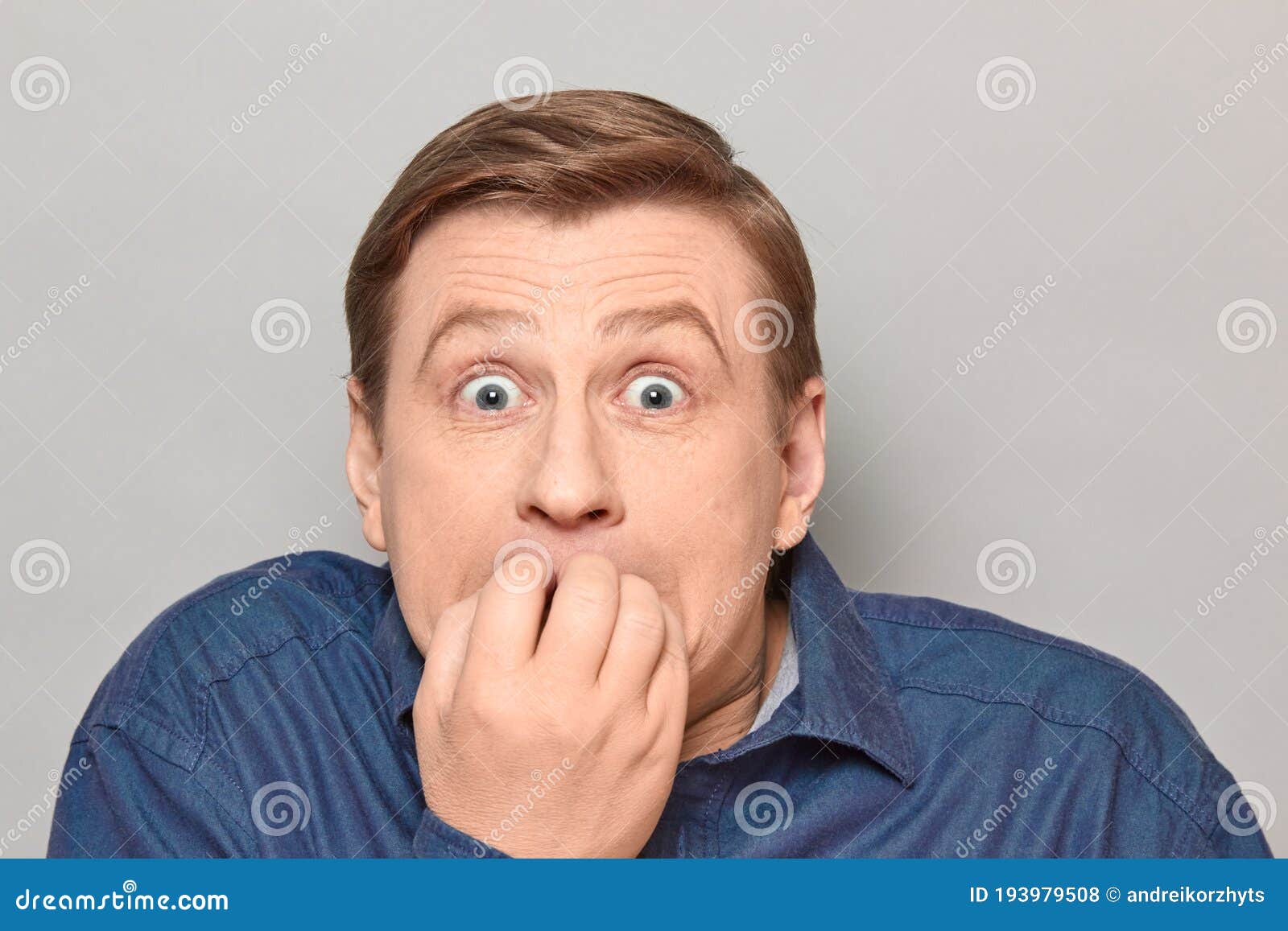 Portrait Of Shocked Frightened Man With Eyes Widened And Full Of Fear