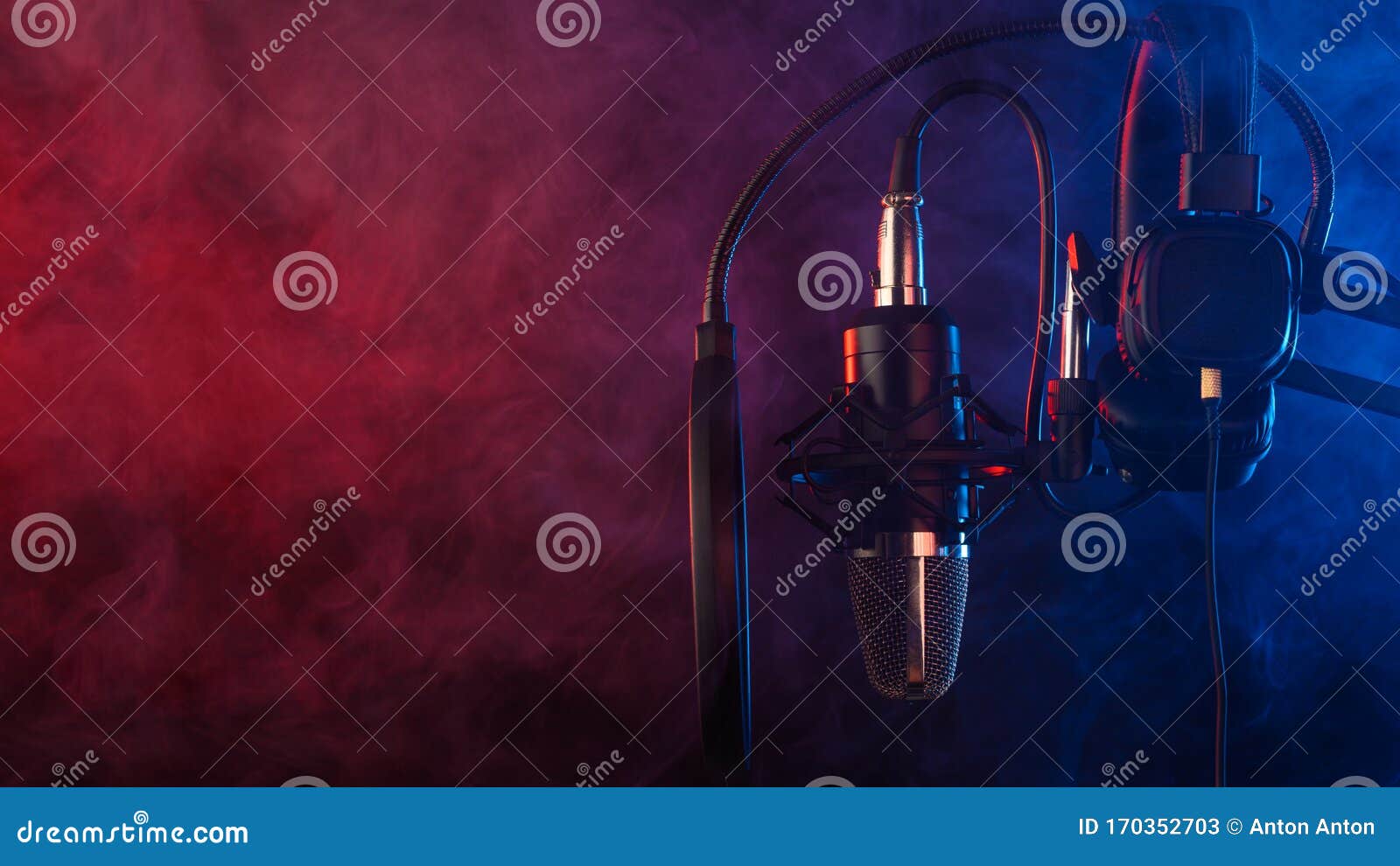 studio microphone and headphones on mic stand against .color disco background. vocals and radio, podcasts