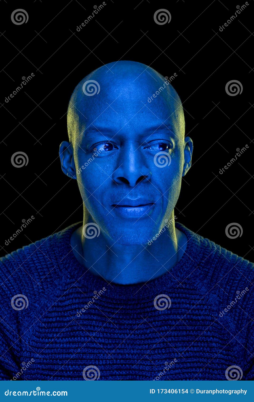 Studio Photo with Blue Light of a Black Man Looking Sideways Stock Photo -  Image of artistic, person: 173406154