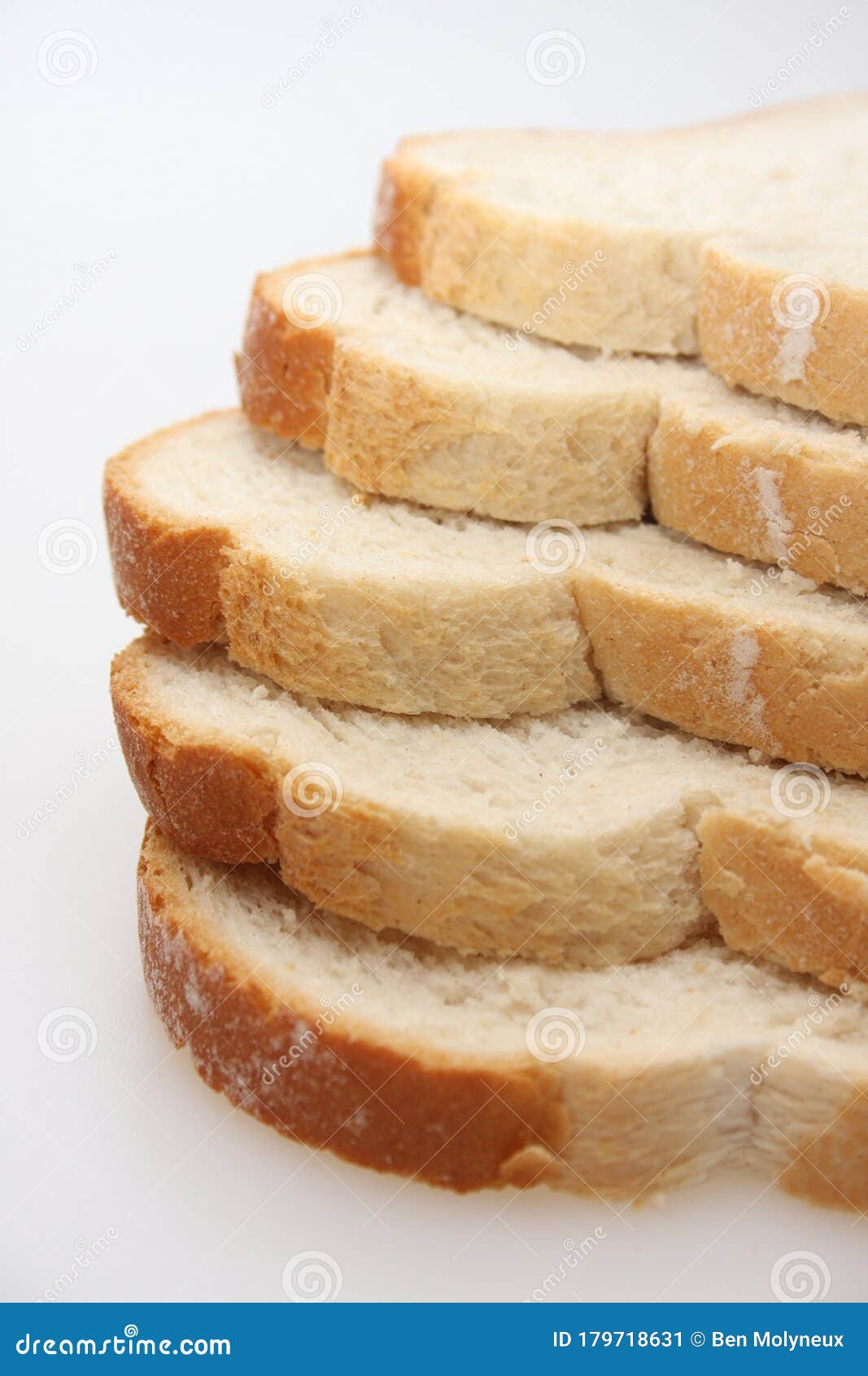 a studio photograph of 5 slices of white bread