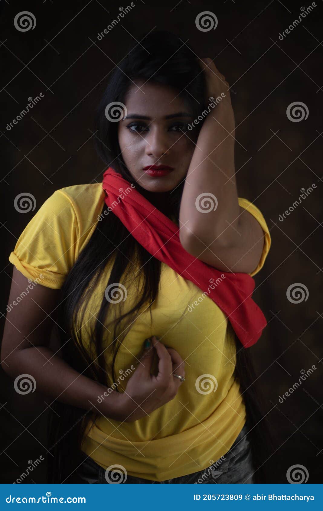 Studio Portrait of a Beautiful and Young Indian Bengali Female Model in  Yellow Tee Shirt and Jeans Hot Pat Stock Image - Image of brunette,  provocative: 205723809