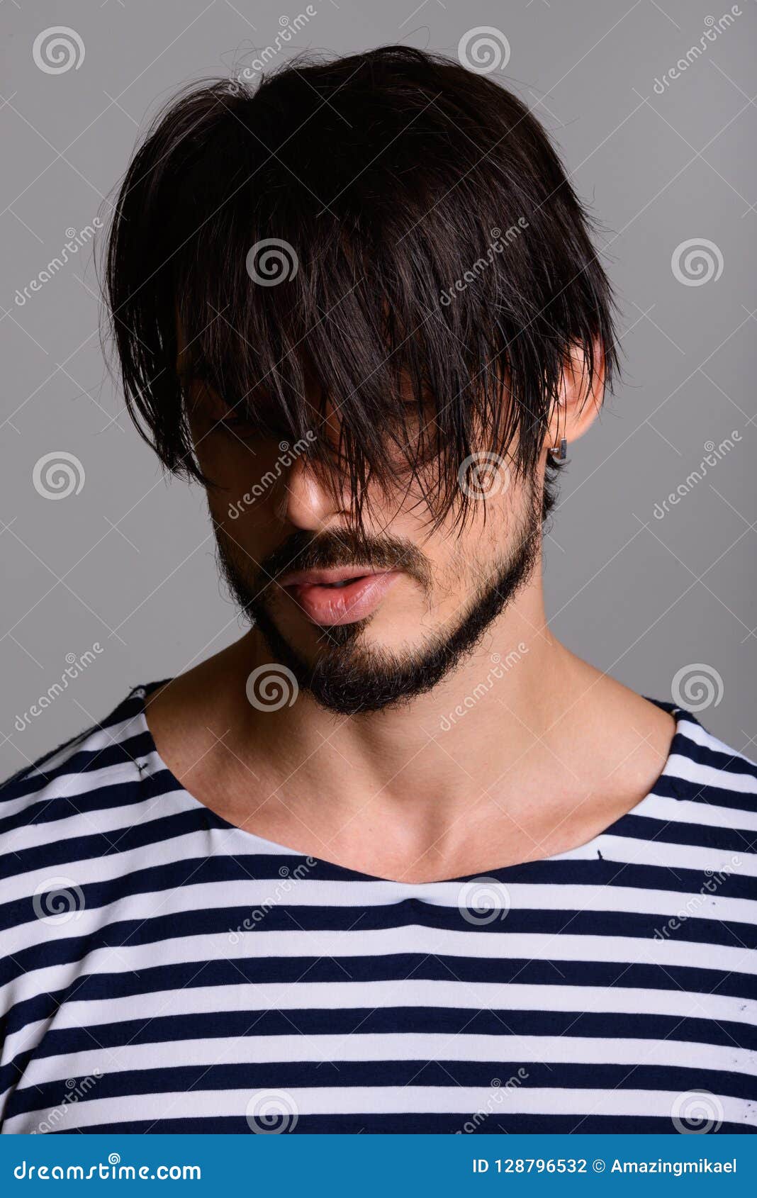 Face of Handsome Man Covering Face with Hair Stock Photo - Image of  earrings, pose: 128796532