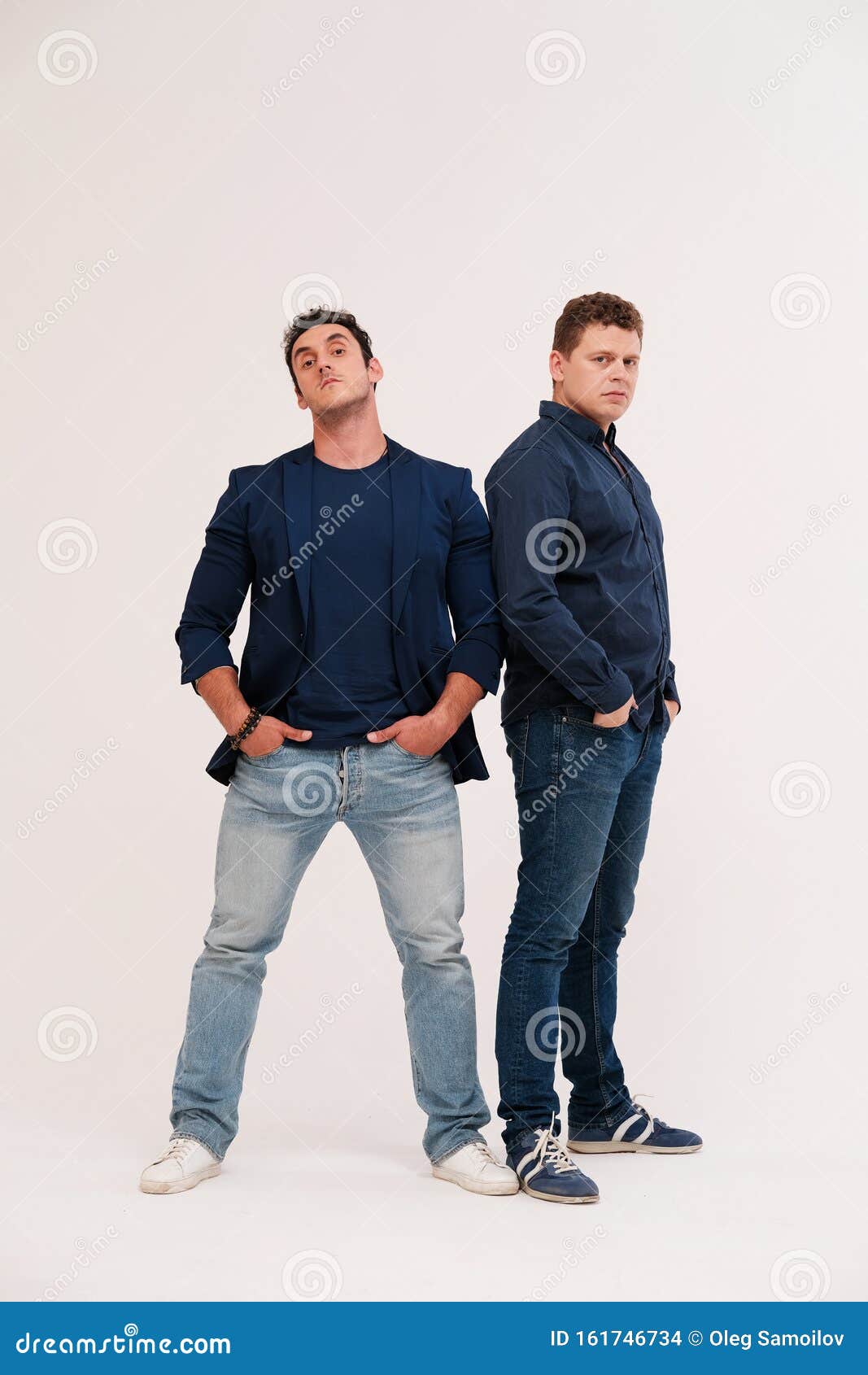 Studio Portrait Of Two Male Friends Stock Photo Image Of White