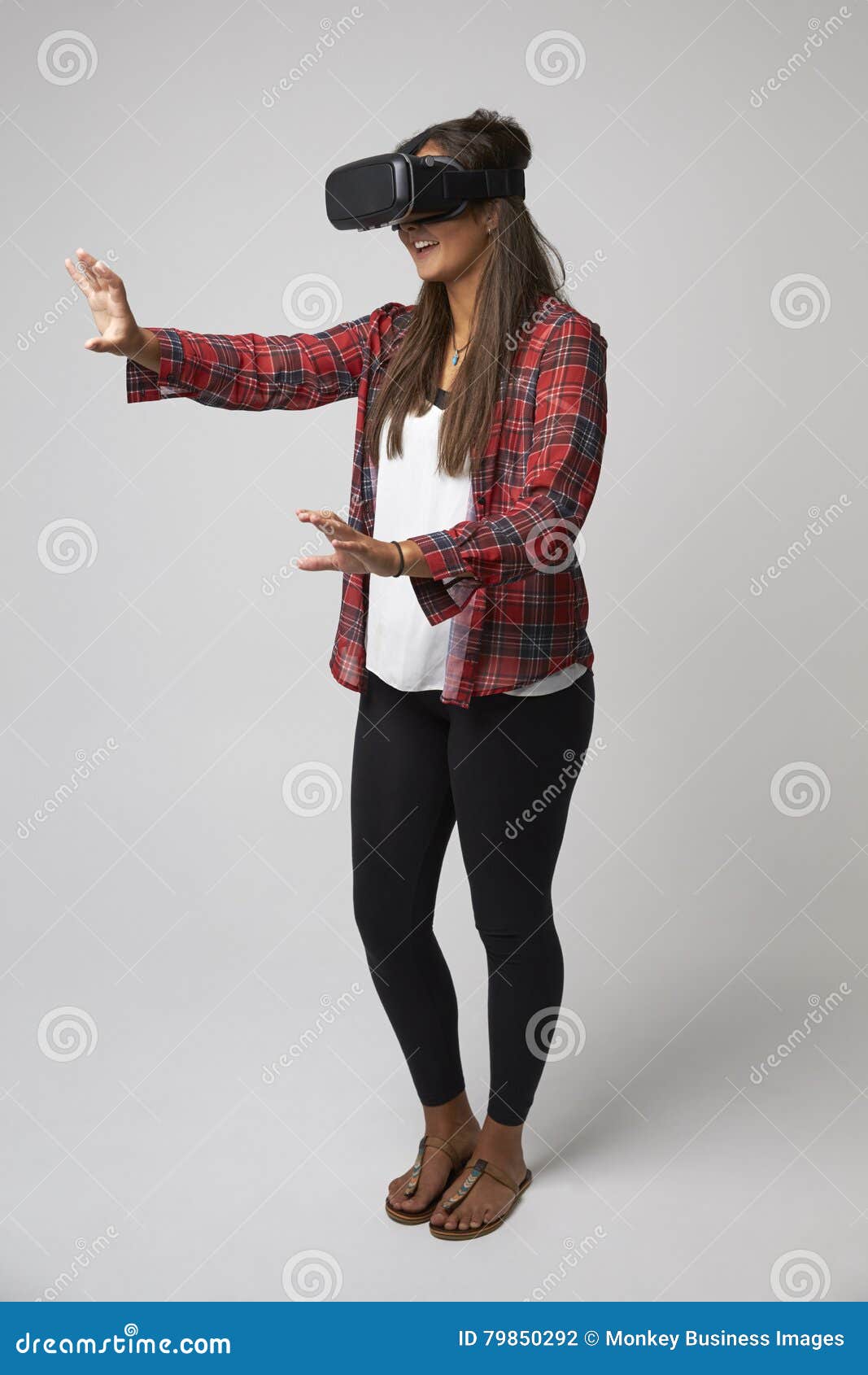 Studio Portrait of Video Game Designer Wearing VR Headset Stock Photo