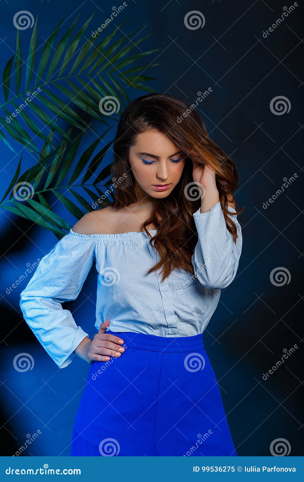 Studio Portrait of Young Model with Green Leaves Stock Image - Image of ...