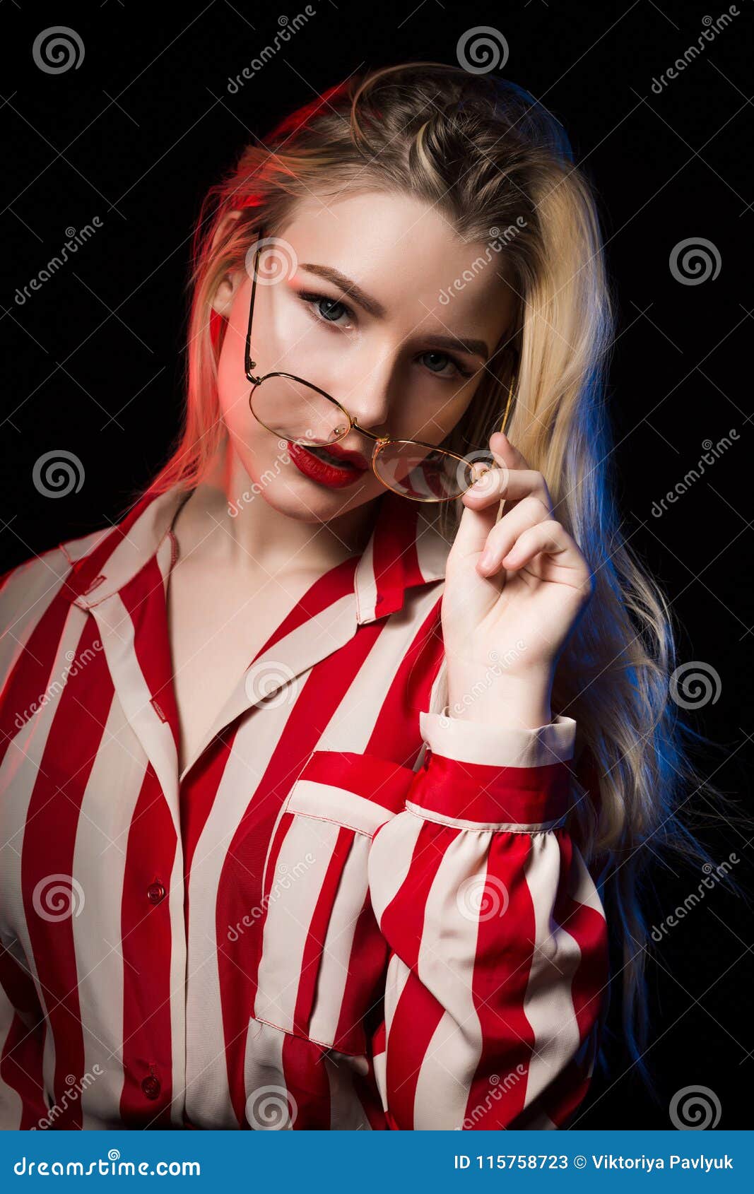 Studio Shot of Adorable Blonde Girl in Glasses Wearing Striped B Stock ...