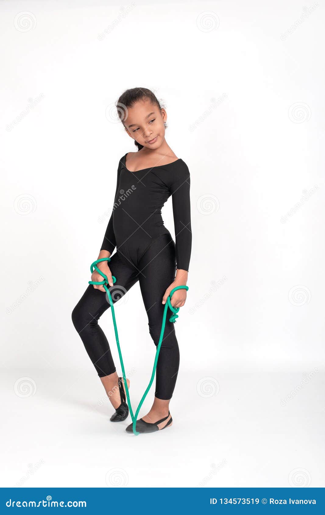 Studio Shot of Attractive Little Gymnast Girl of Mulatta Wearing Black ...