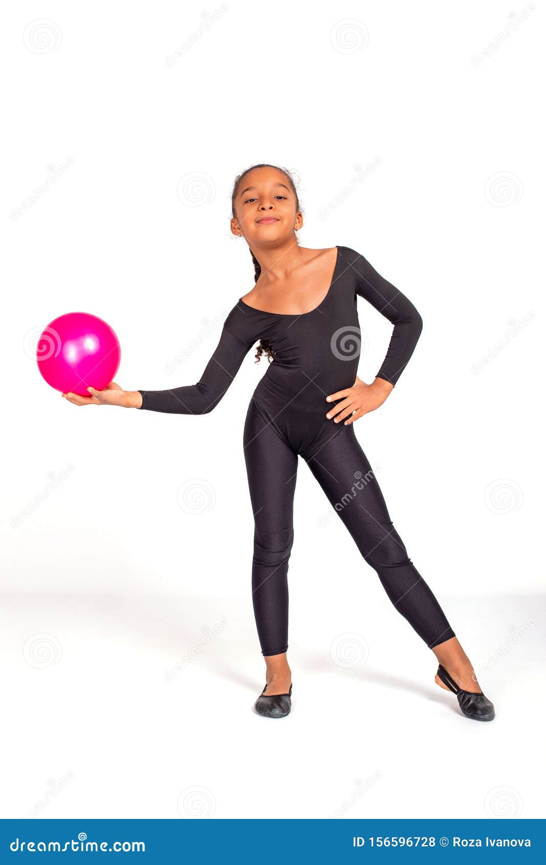 Attractive Little Gymnast Girl of Mulatta with a Pink Ball on a White ...