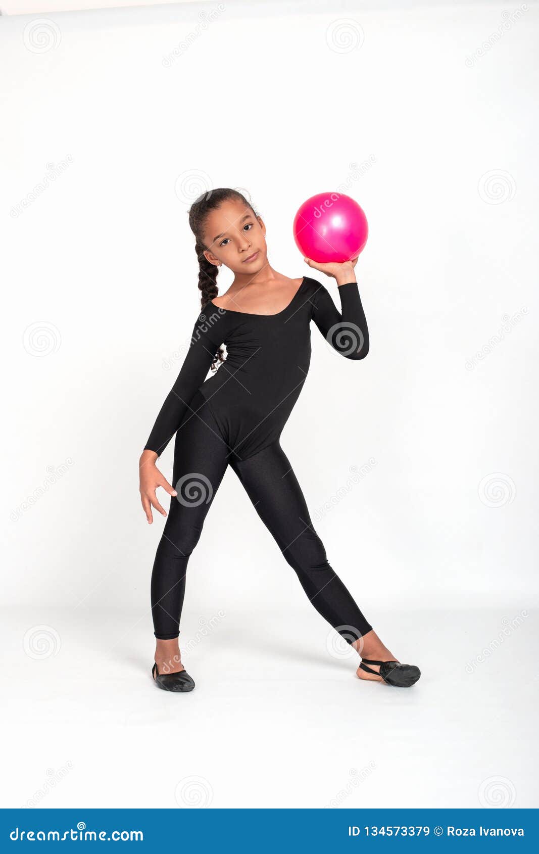 Studio Shot of Attractive Little Gymnast Girl of Mulatto with Long ...