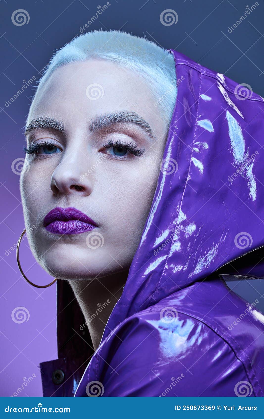Lost in the Purple. Studio Shot of a Beautiful Woman Woman Wearing a ...