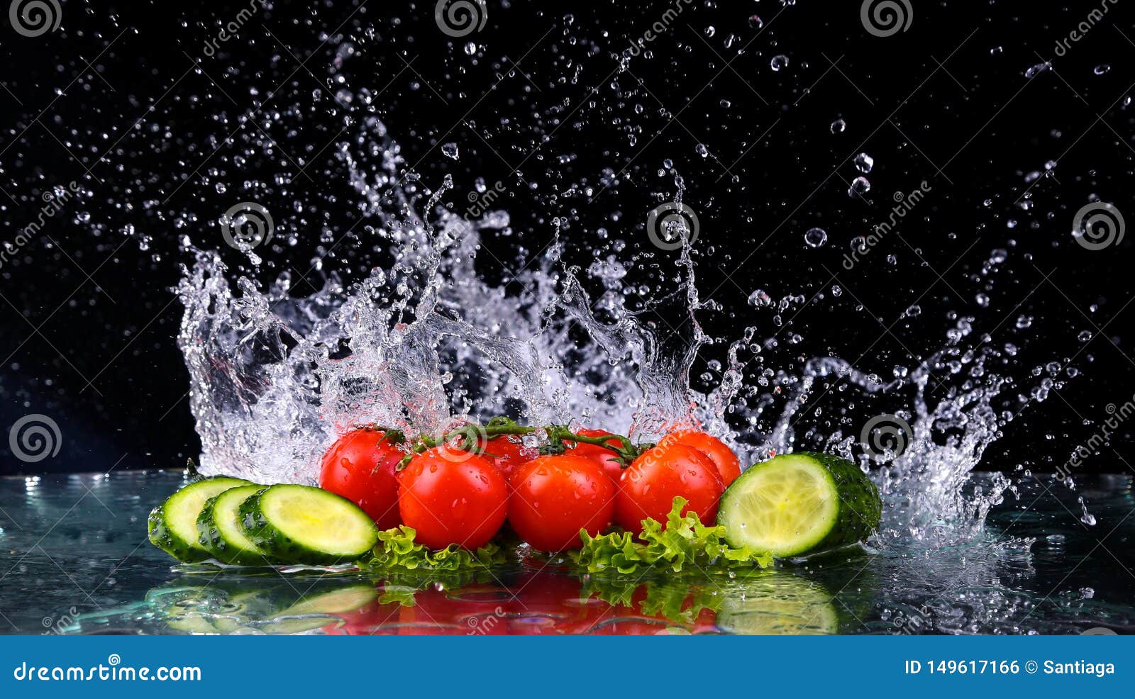 Studio Shot With Freeze Motion Of Cherry Tomatoes And Slices Of