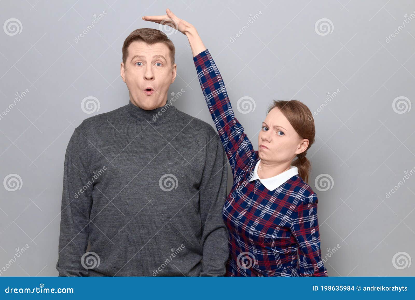 335 Tall Woman Short Man Stock Photos - Free & Royalty-Free Stock Photos  from Dreamstime