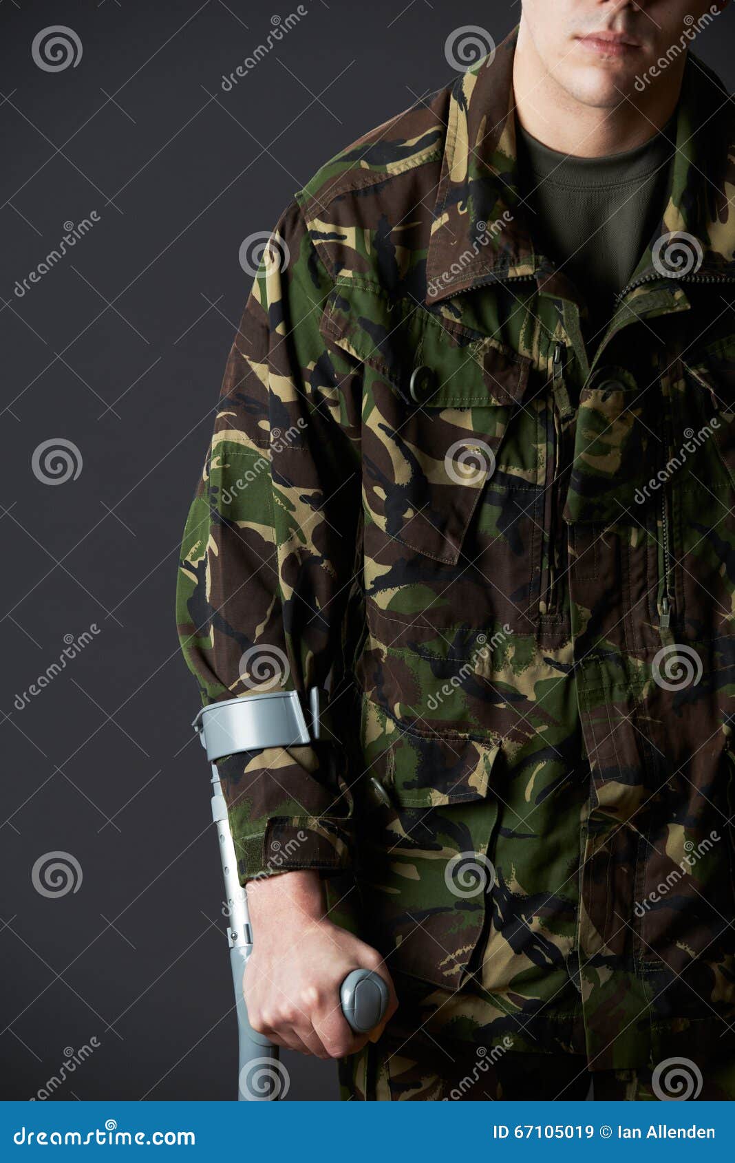 Studio Shot of Wounded Soldier Using Crutch Stock Image Image of