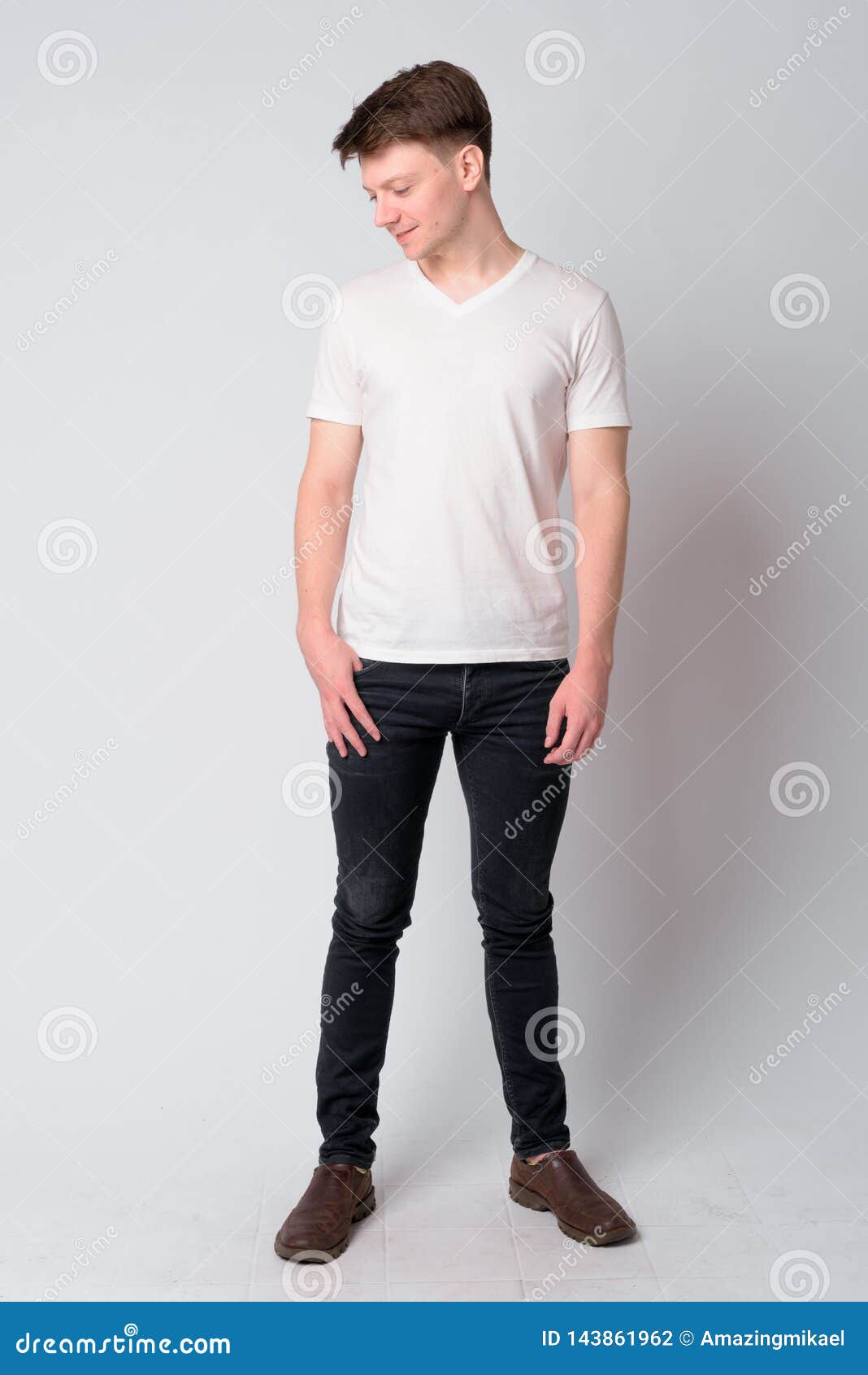 Full Body Shot of Young Handsome Man Looking Down Stock Photo - Image ...