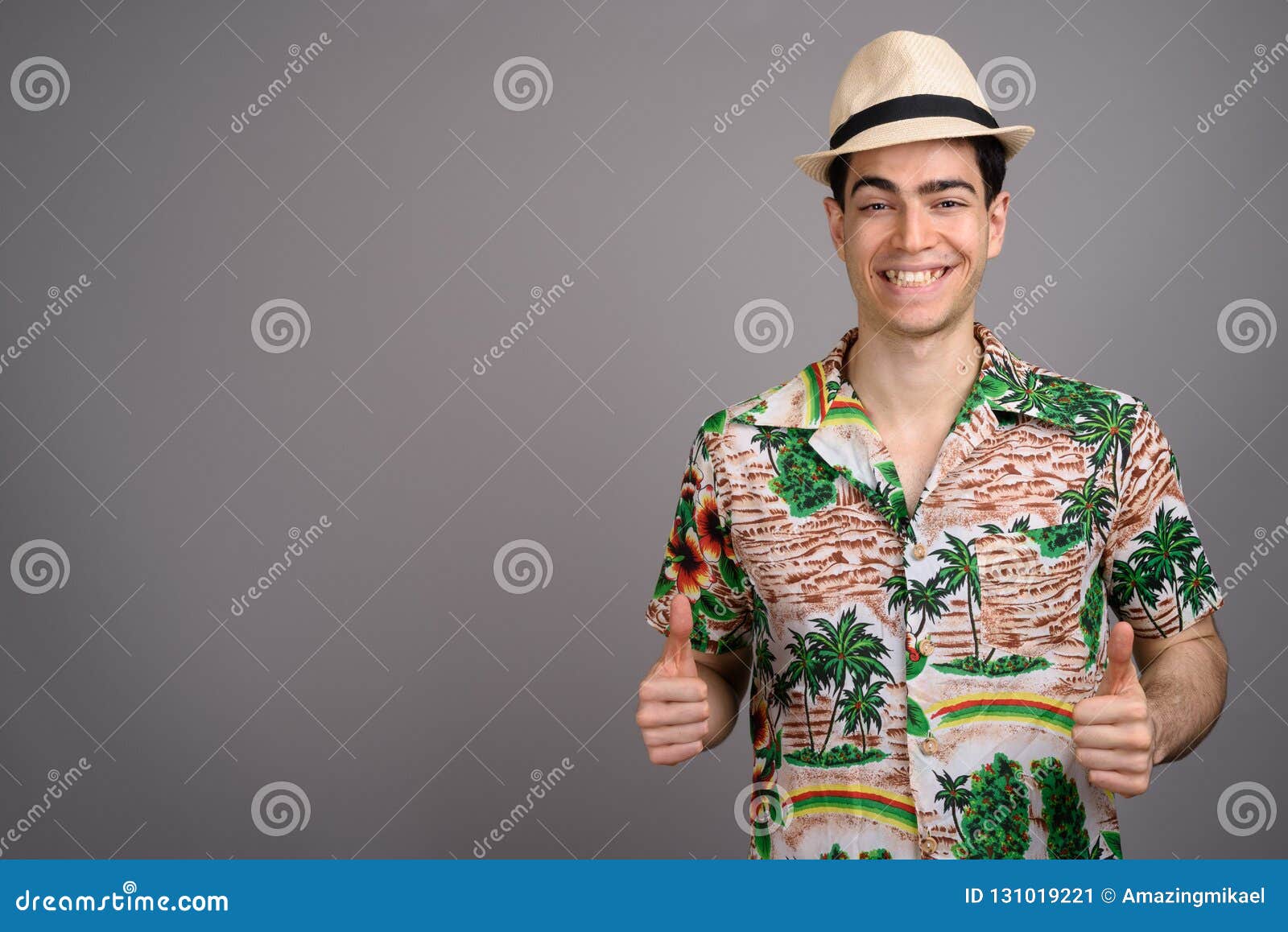 Young Handsome Tourist Man Ready for Vacation Against Gray Backg Stock ...