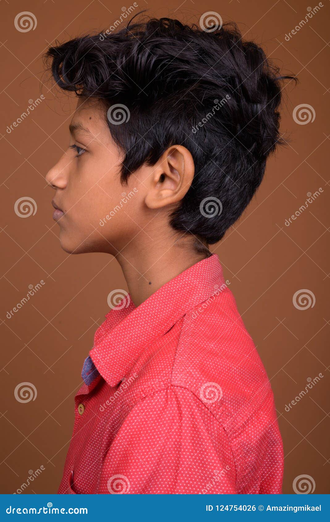 Young Indian Boy Wearing Smart Casual Clothing Against Brown Bac Stock  Photo - Image of shirt, south: 124754026