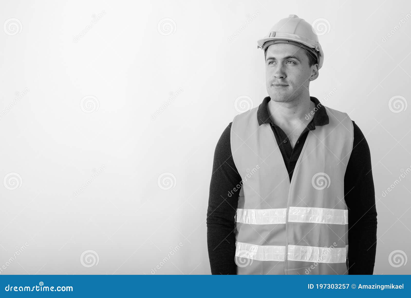 Studio Shot of Young Muscular Man Construction Worker Thinking while ...