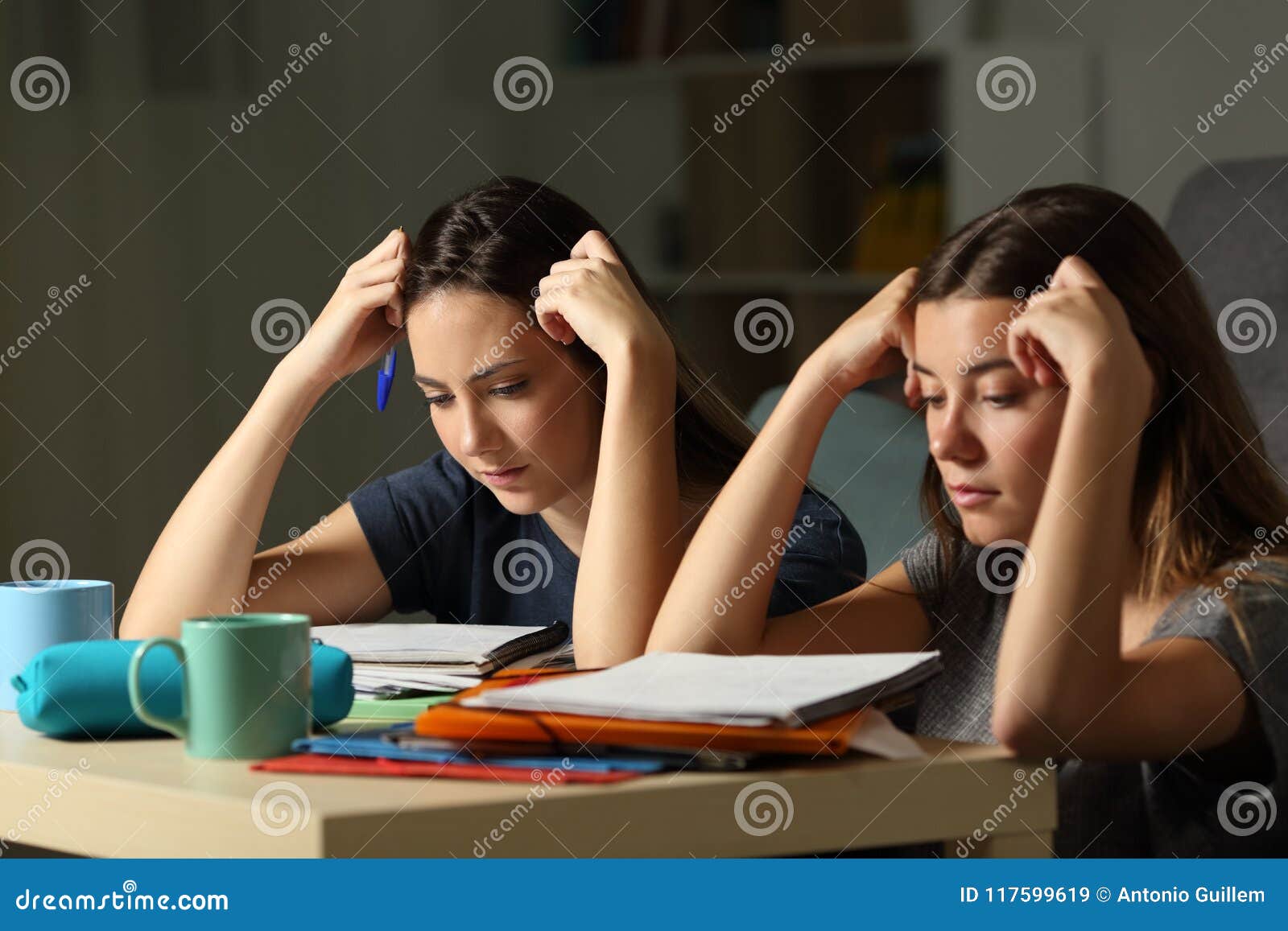 studious students memorizing late hours in the night at home