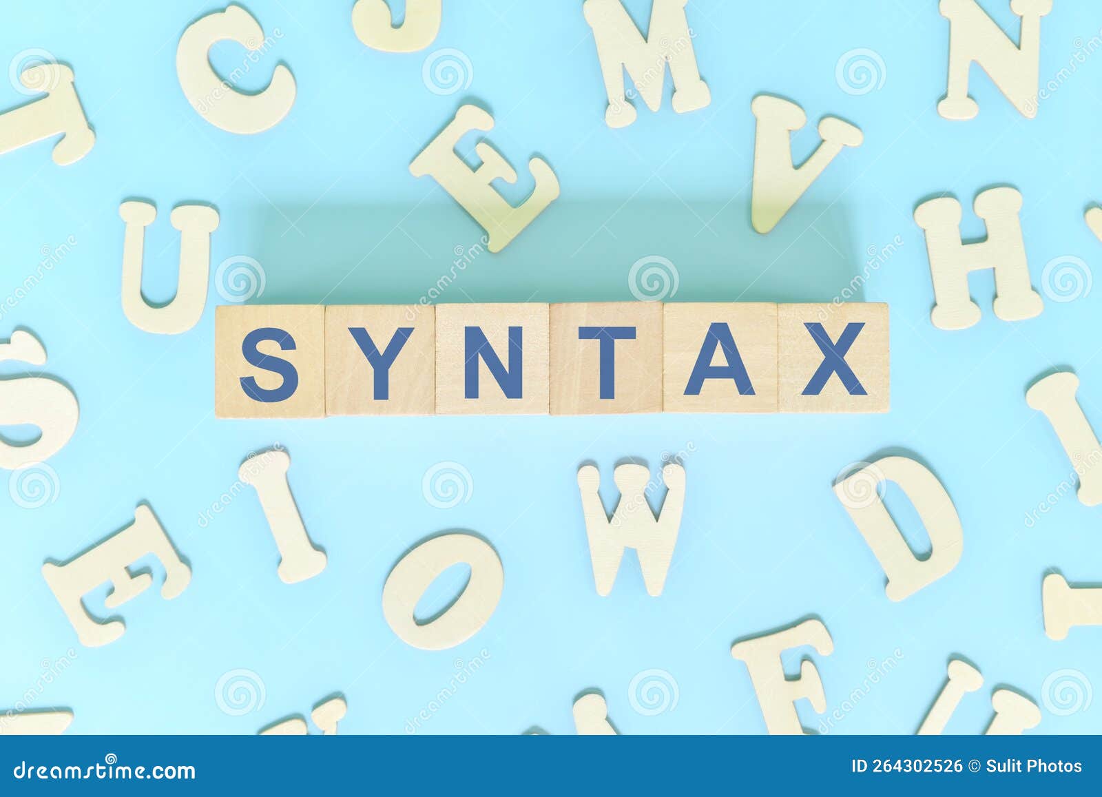 study syntax in linguistics concept. wooden blocks word typography flat lay in blue background.