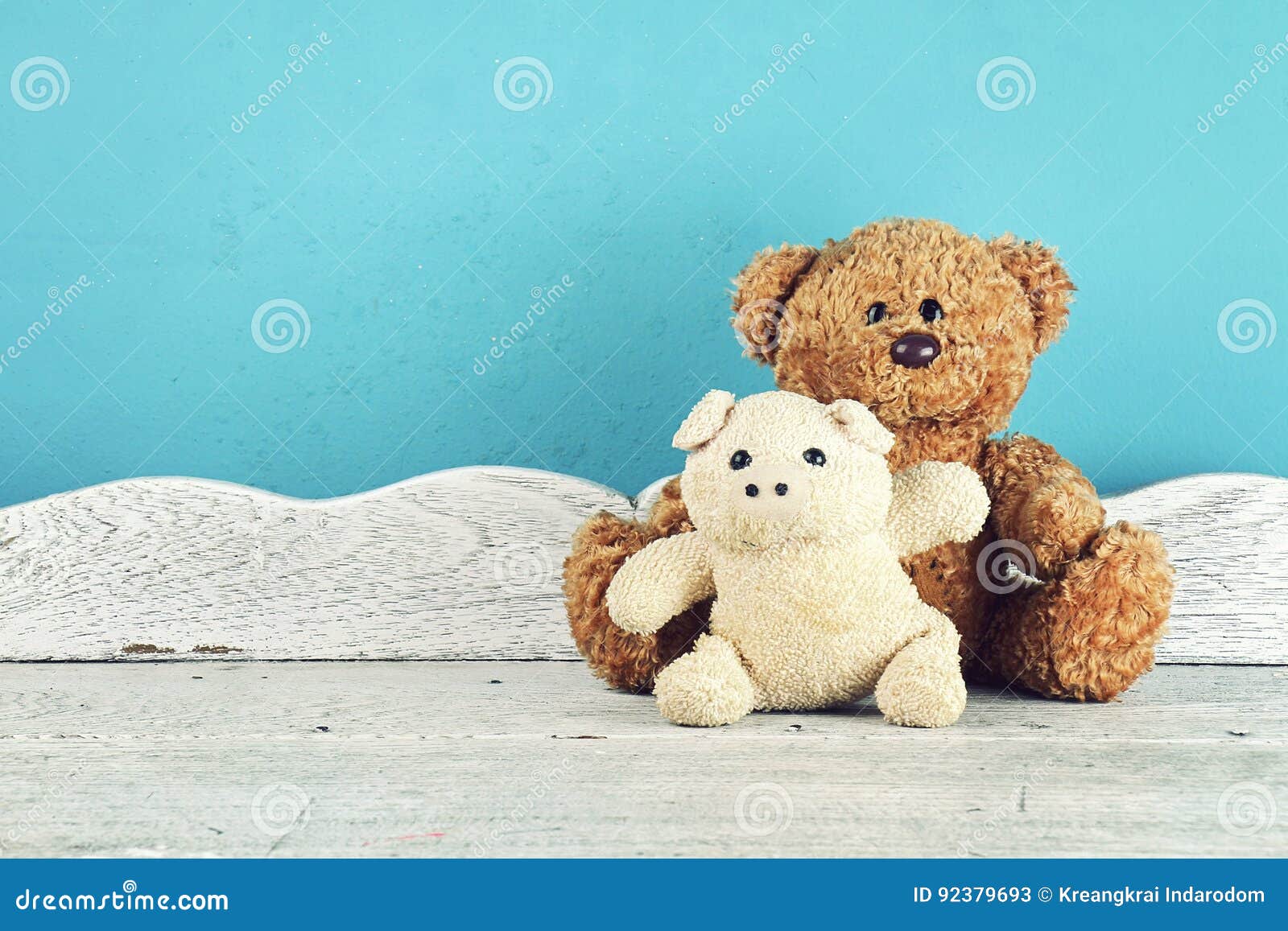 stuffed animal toys on the white wooden table, animal dolls, friends concept.