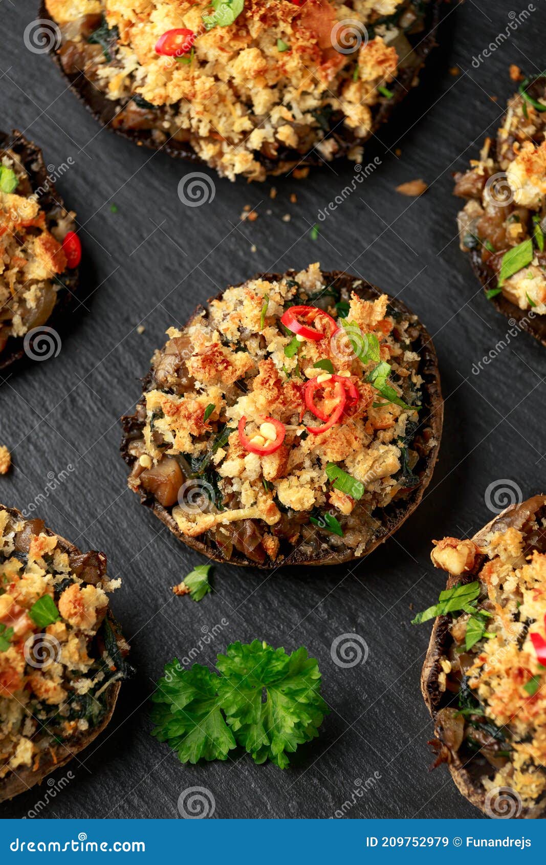 Stuffed Mushrooms with Spinach, Bread Crumbs and Cheese on Stone Board