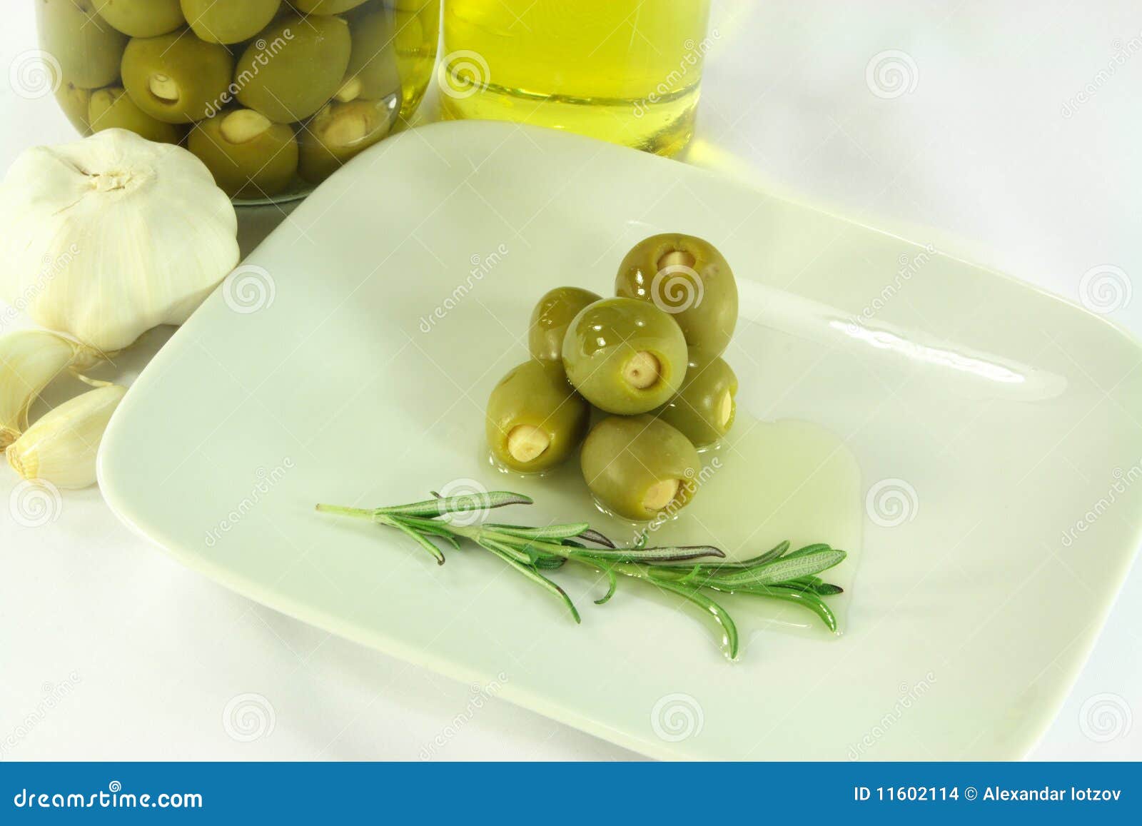 Stuffed Pickled Olives in Dish with Olive Oil. Stock Photo Image of