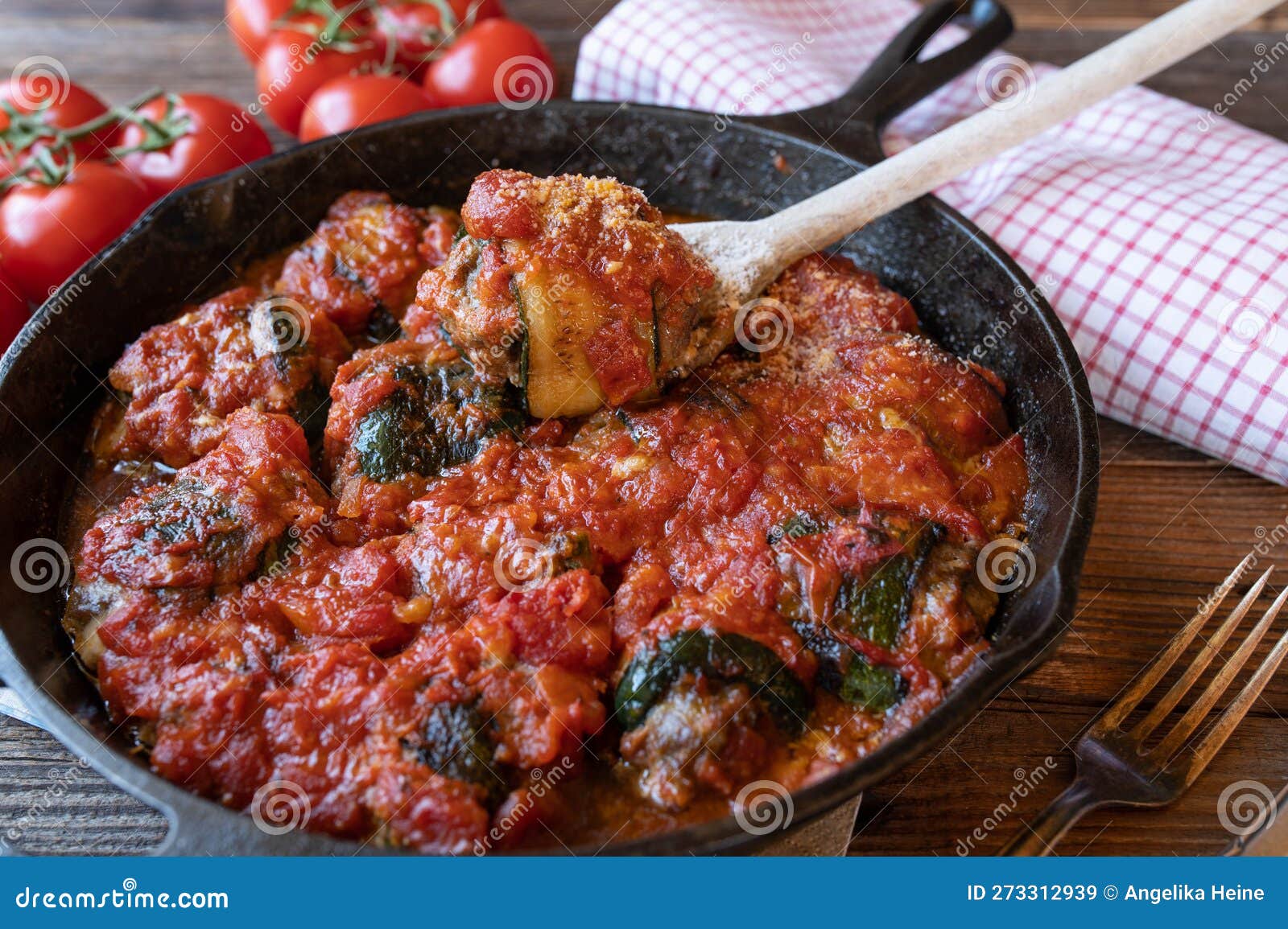 stuffed zucchini with ground beef in a delicious tomato sauce. italian roulades or involtini dish
