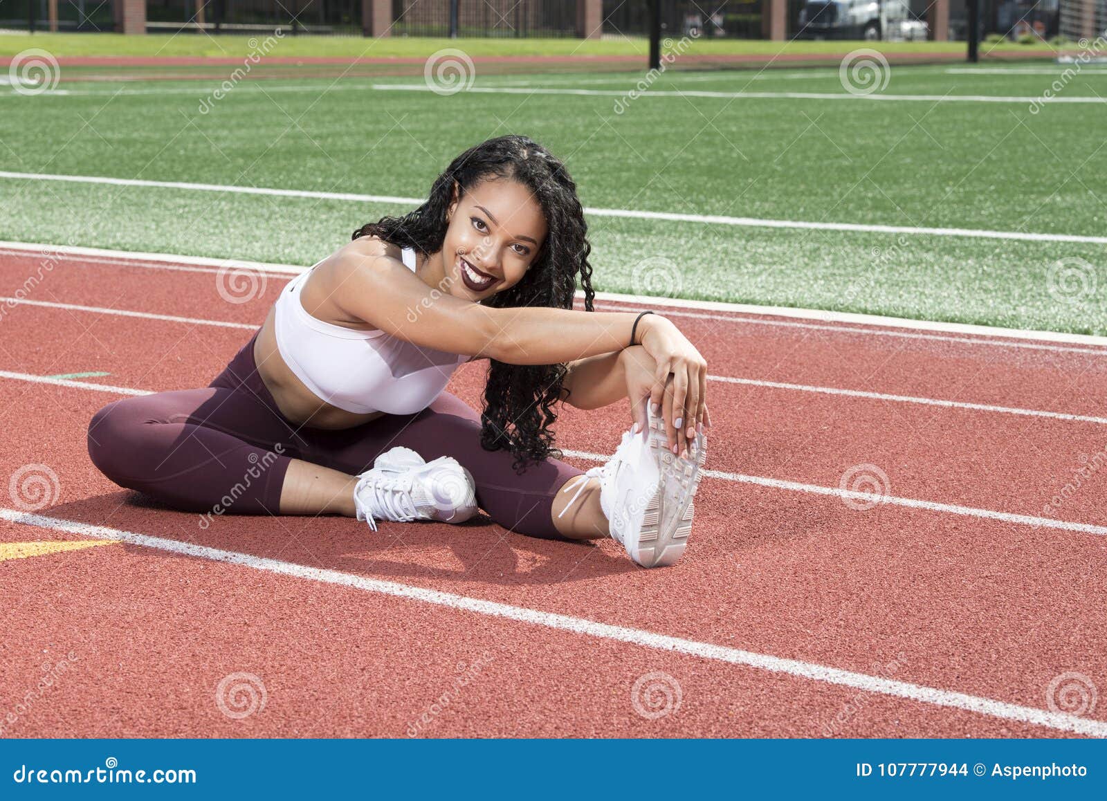 Stunning African American Fitness Model on Outdoor Track Stock Photo