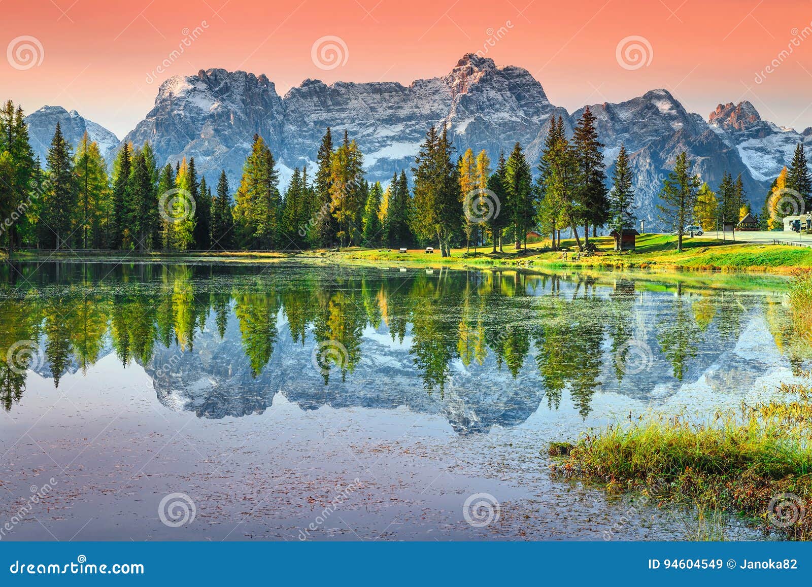 stunning alpine lake in dolomites mountains, antorno lake, italy, europe