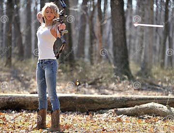 Stunning Blonde Female Archer - Arrow Leaving Bow Stock Photo - Image ...