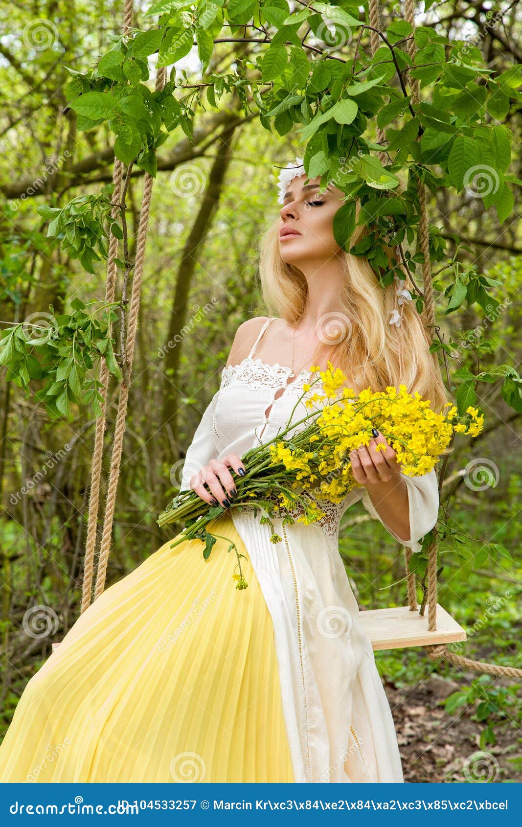 Stunning Blonde Natural Woman Swing on a Swing on a Tree Wearing a ...