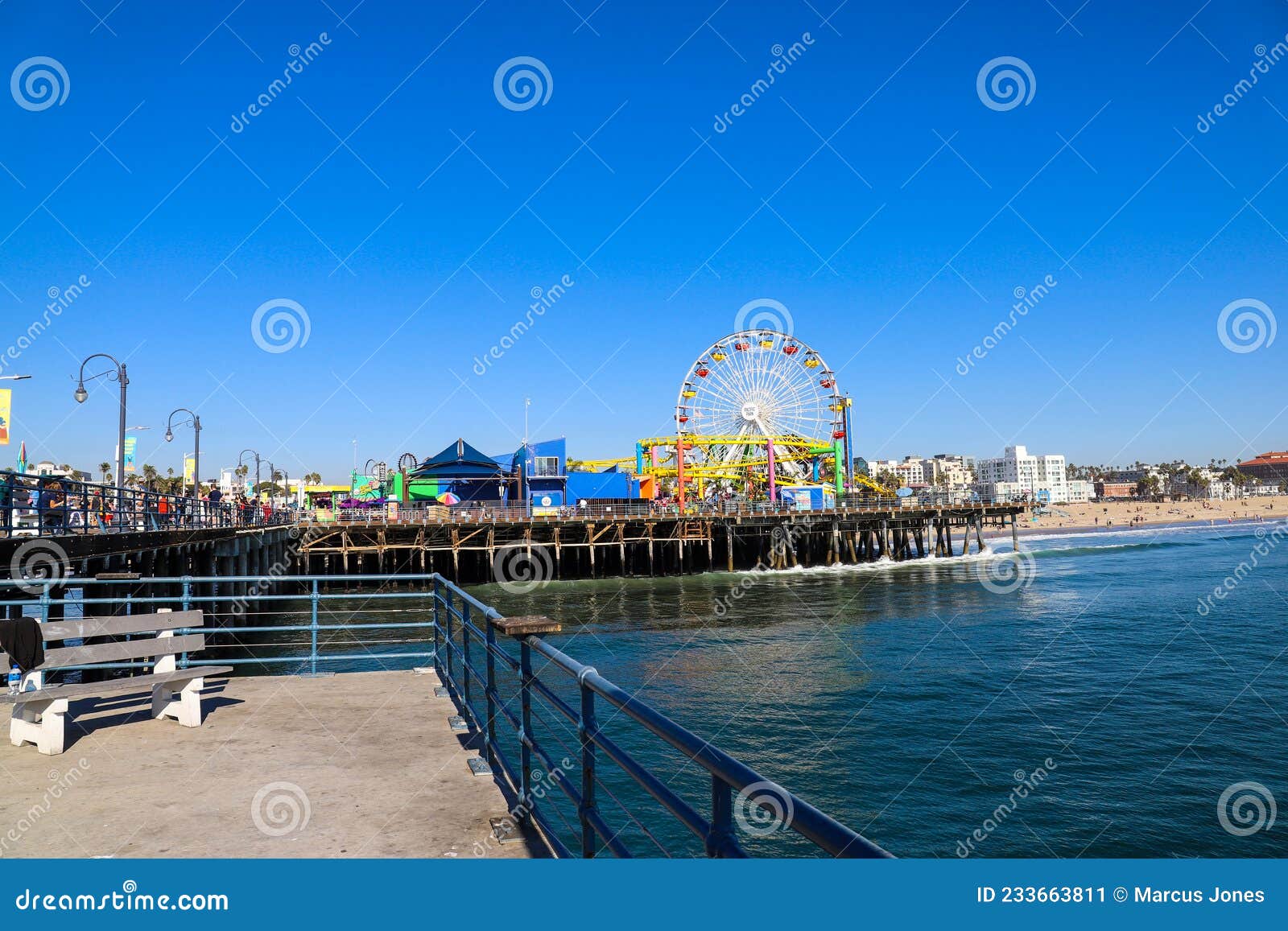 A Stunning Shot of a Colorful Ferris Wheel, Rollercoaster and Carnival  Games on a Long Brown Wooden Pier Editorial Photo - Image of buildings,  colorful: 233663811