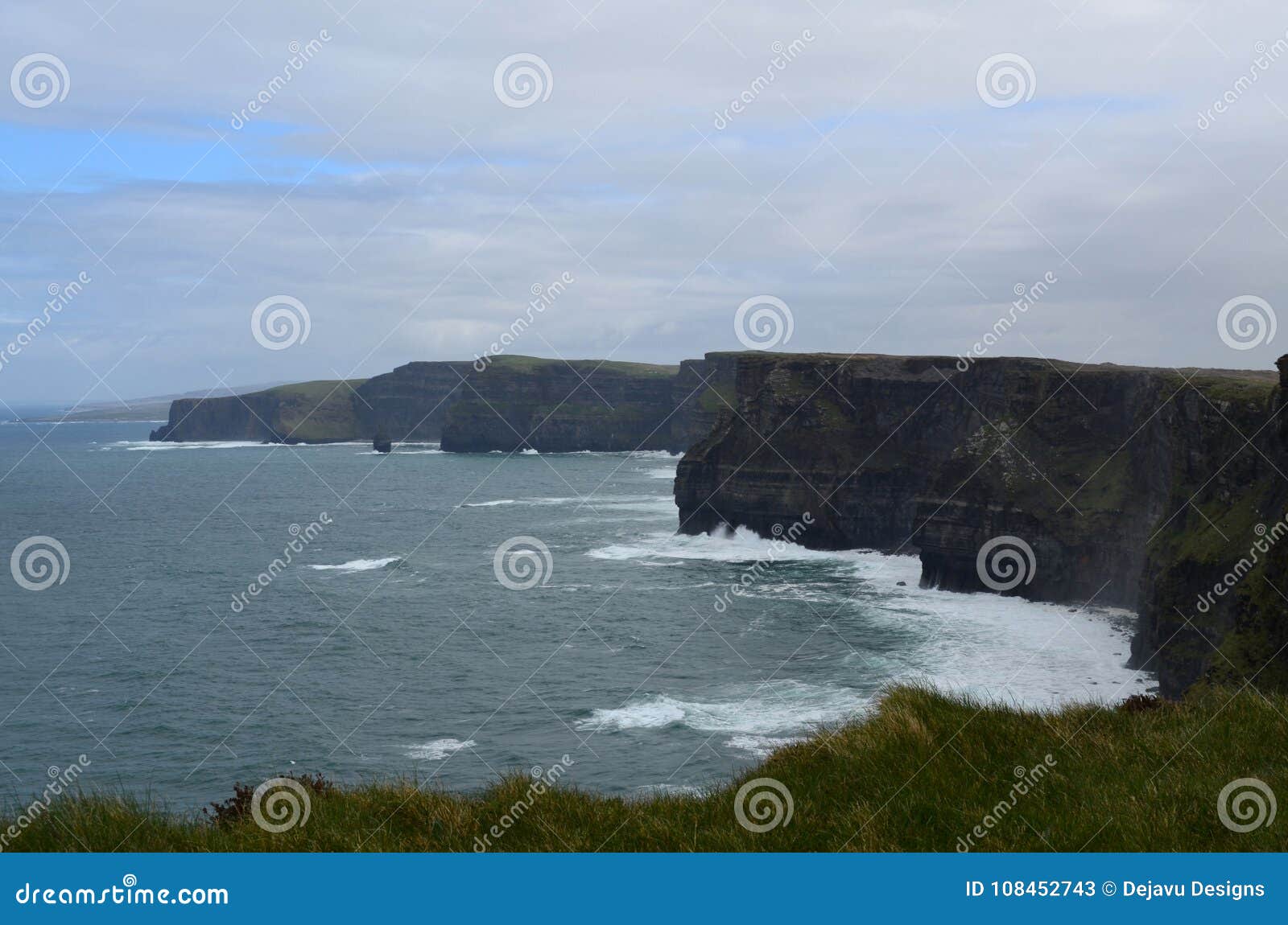 stunning view of aillte an mhothair and blue waters