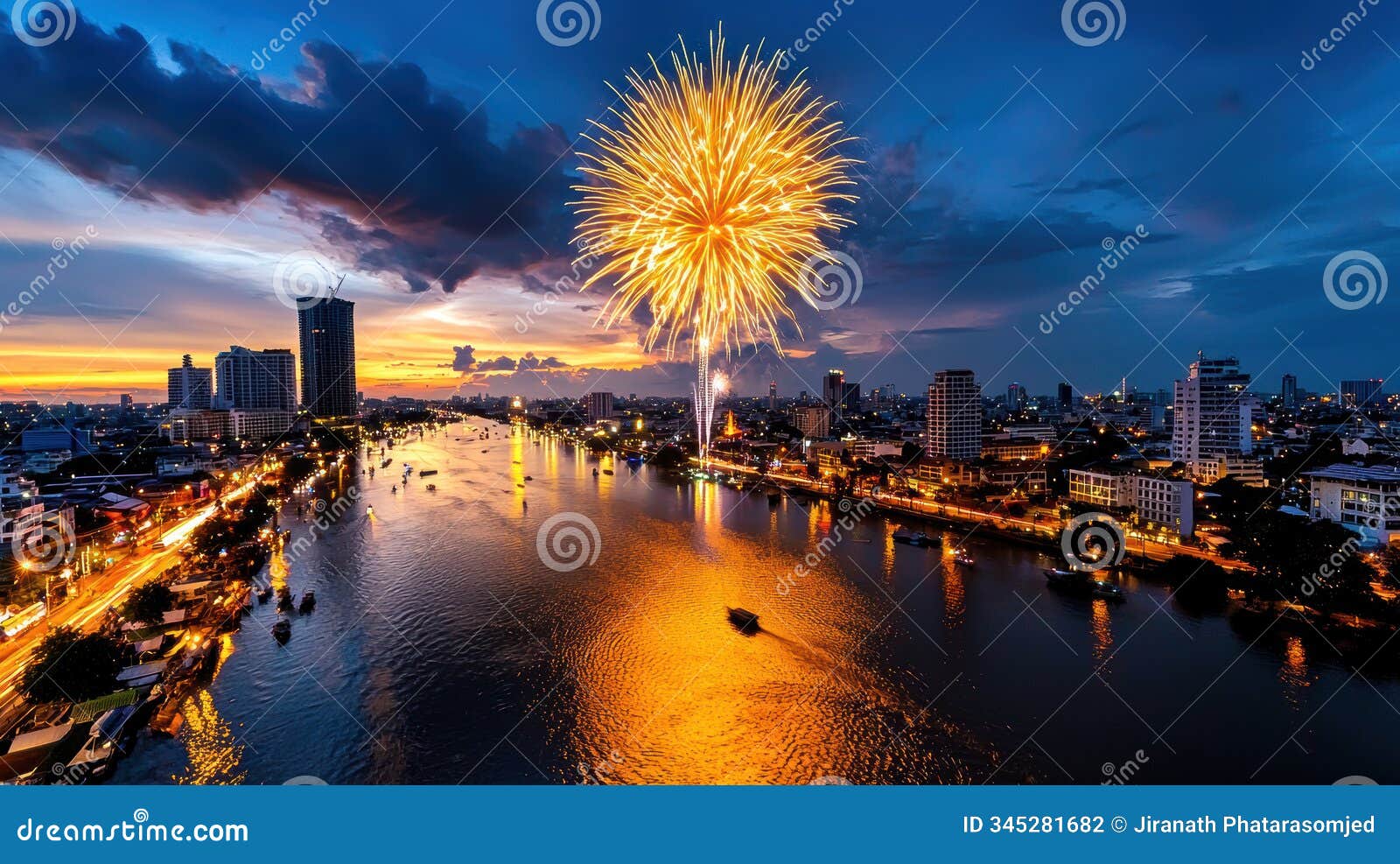 stunning view of city skyline at sunset, featuring vibrant fireworks over river, reflecting golden hues on water. scene captures