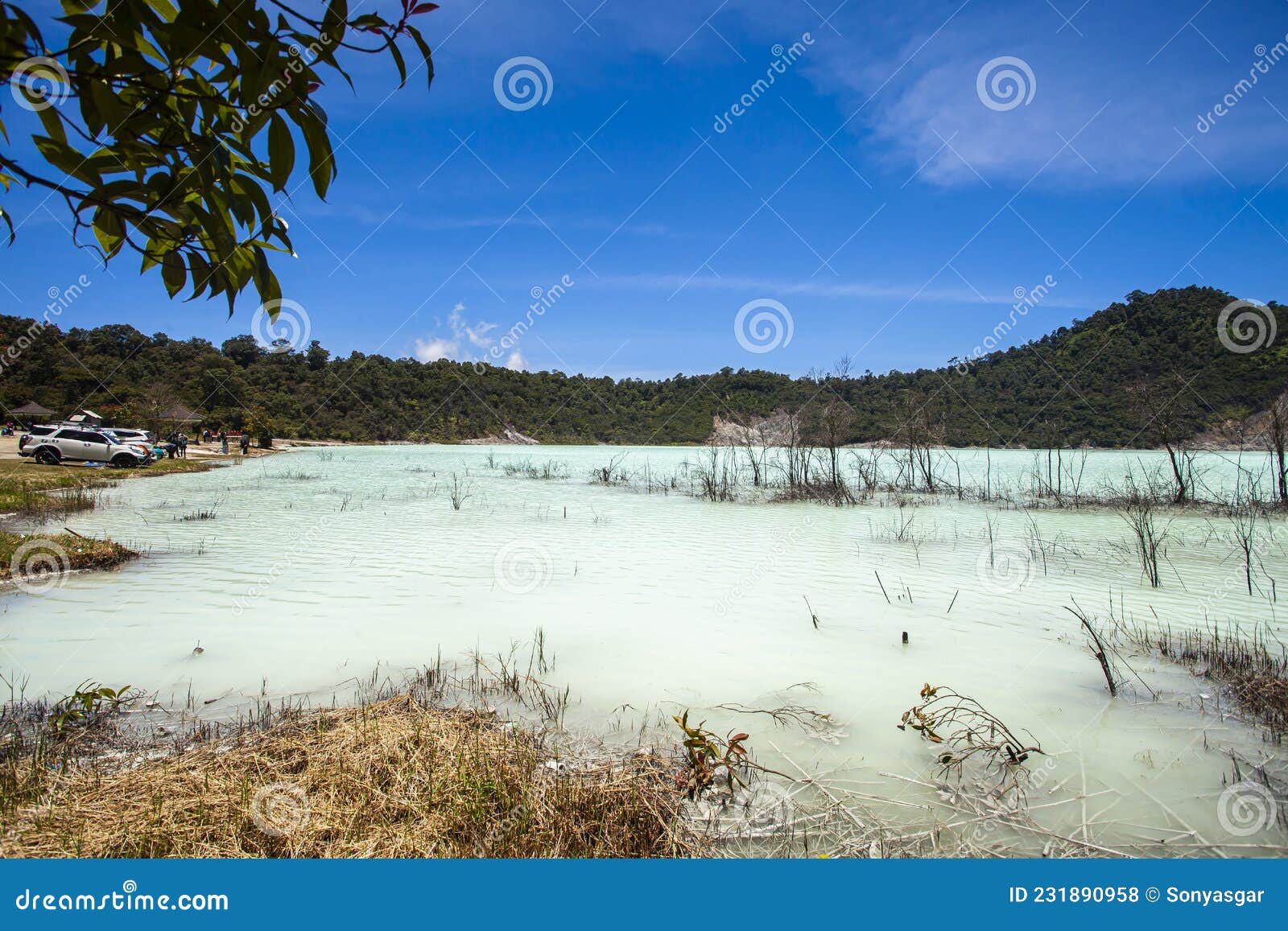 stunning view of the talaga bodas lake surrounded by a green tropical forest in garut, west java, indonesia